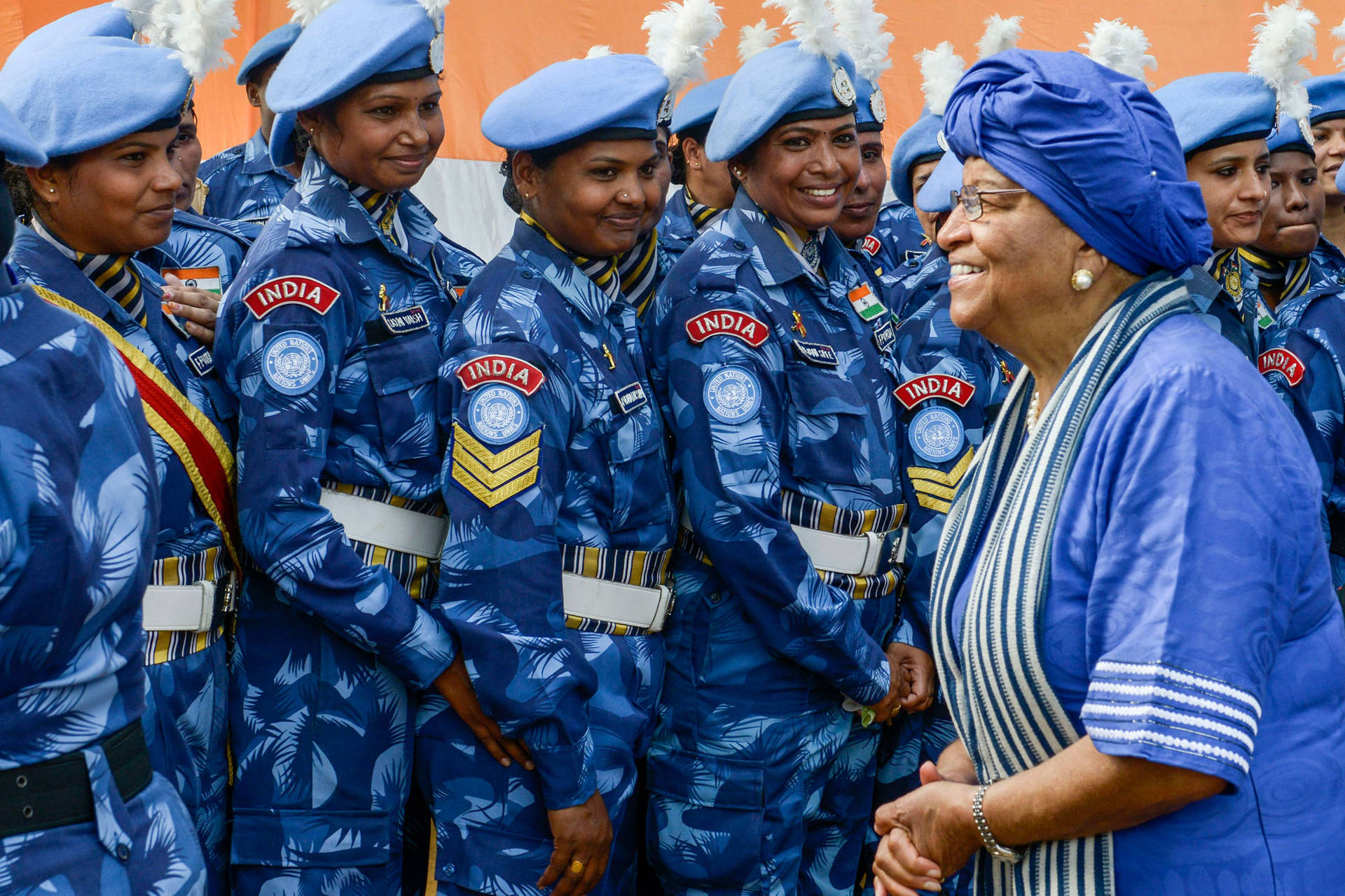 President With Female Indian Police Background