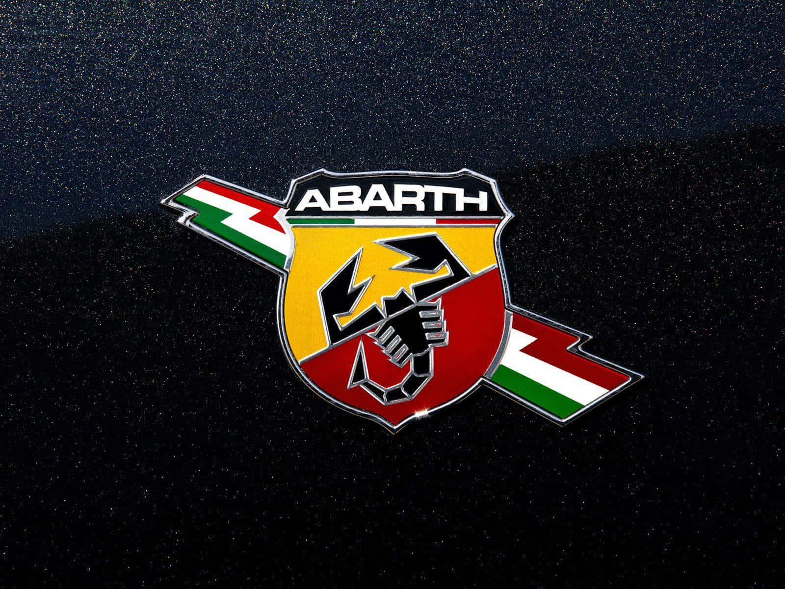 Prestigious Car Logo On A Red Sportscar Background