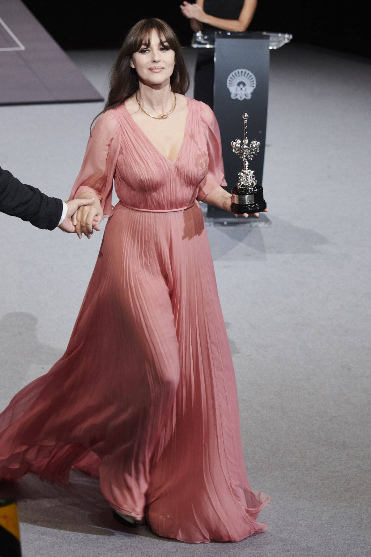 Prestigious Donostia Award Recipient Monica Bellucci At The 65th Edition. Background