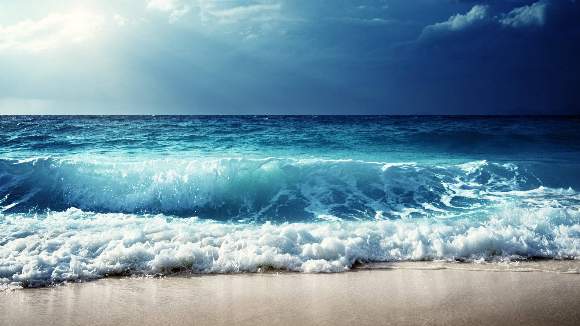 Pretty Blue Sea Waves By The Beach Background