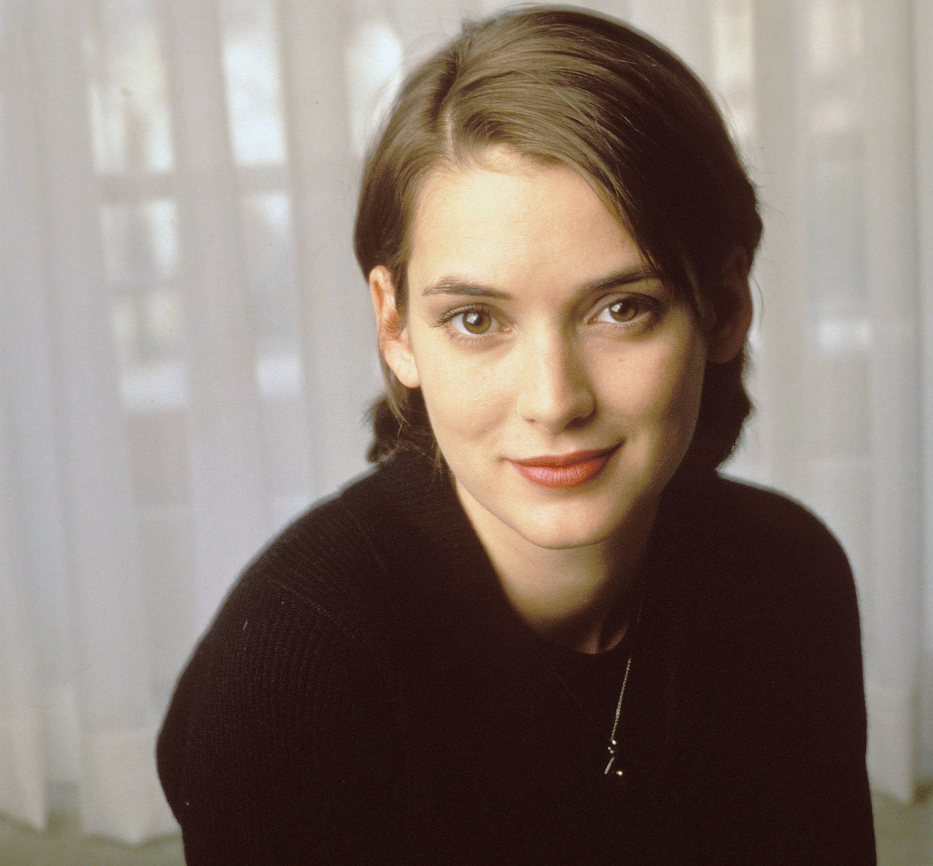 Pretty Young Winona Ryder Background