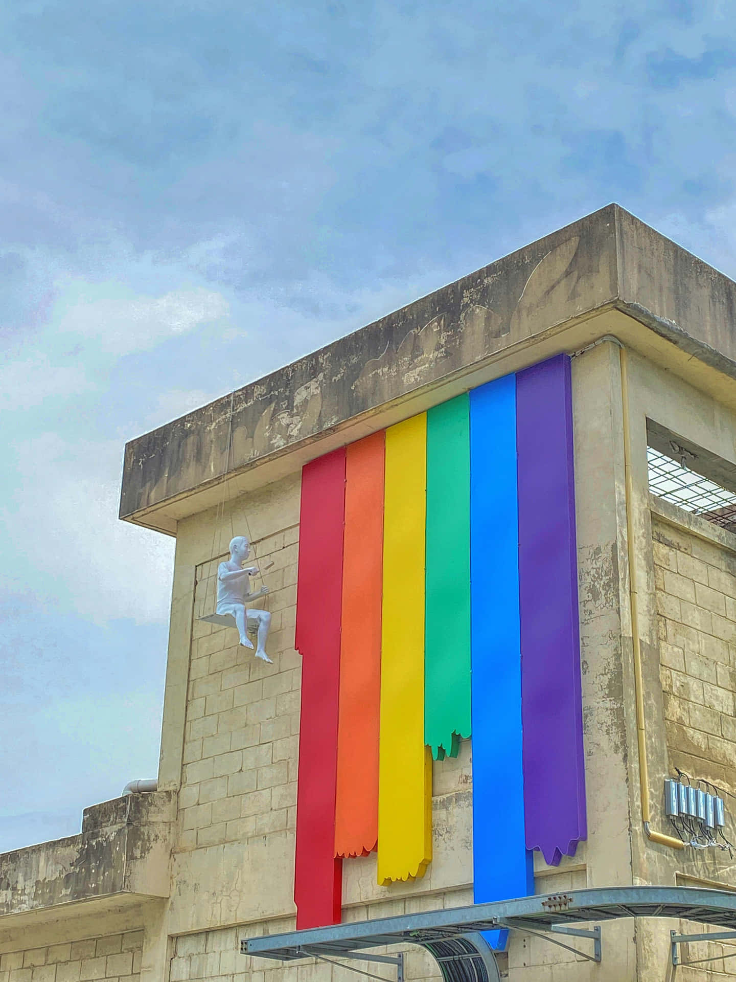 Pride_ Flag_ Display_on_ Building Background