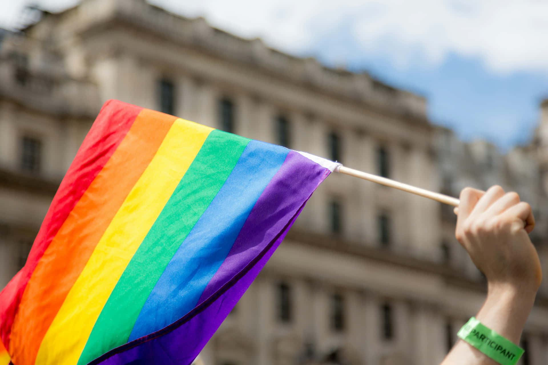 Pride Flag Waving During Parade.jpg