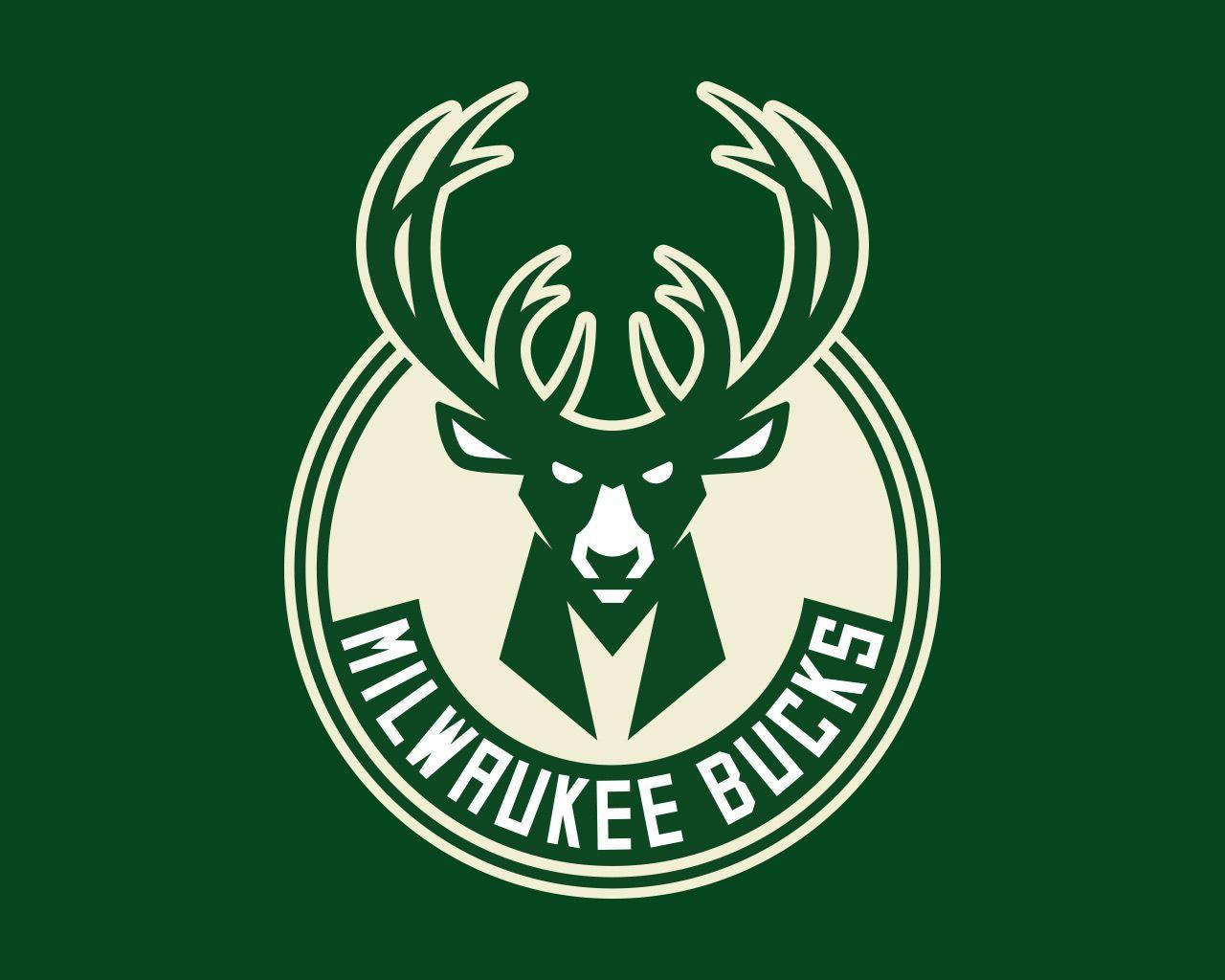 Prided Milwaukee Bucks Green Flag Waving Strong Against Clear Sky Background