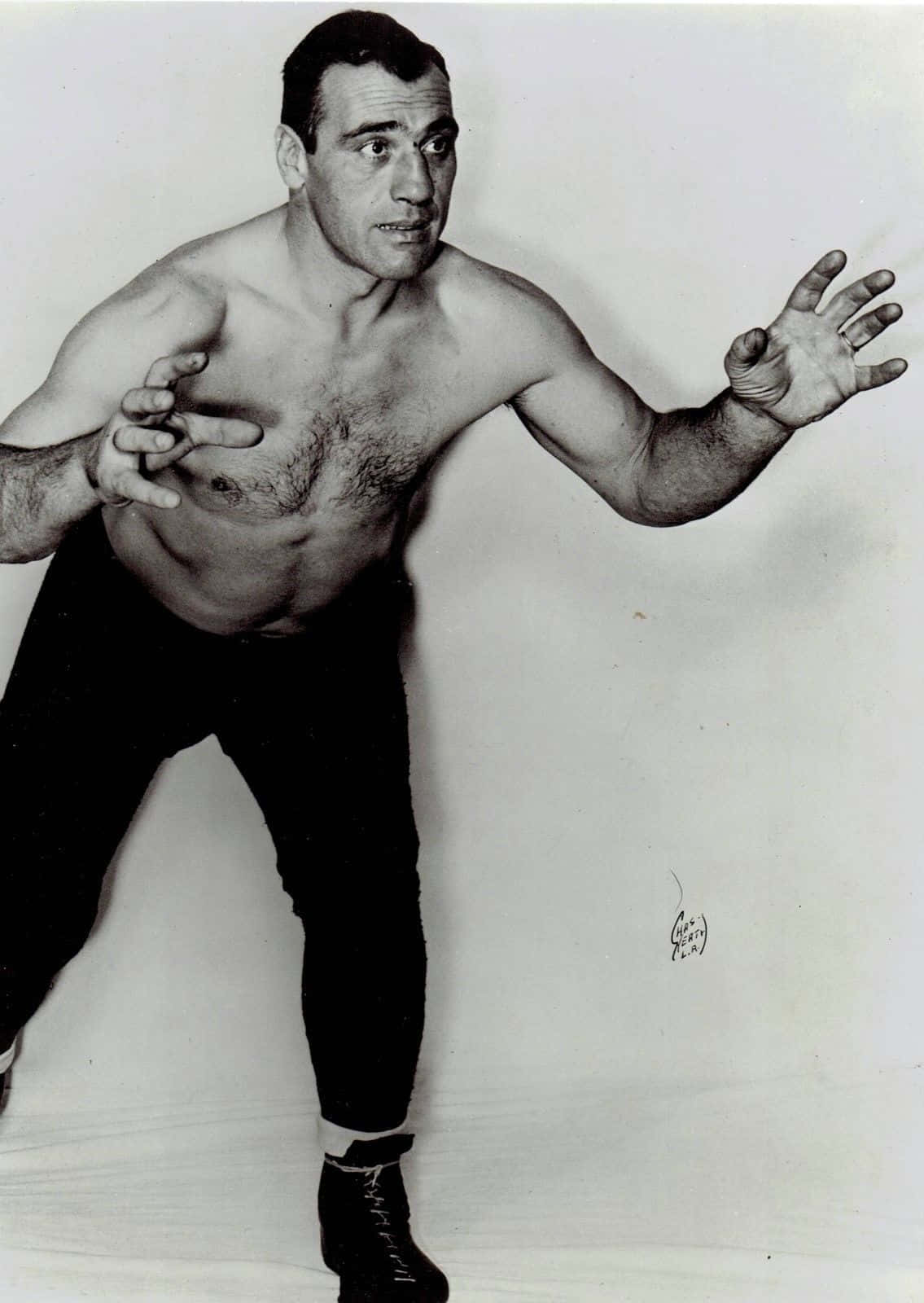 Primo Carnera - The Italian Boxing Legend On A West Coast Wrestling Card Background
