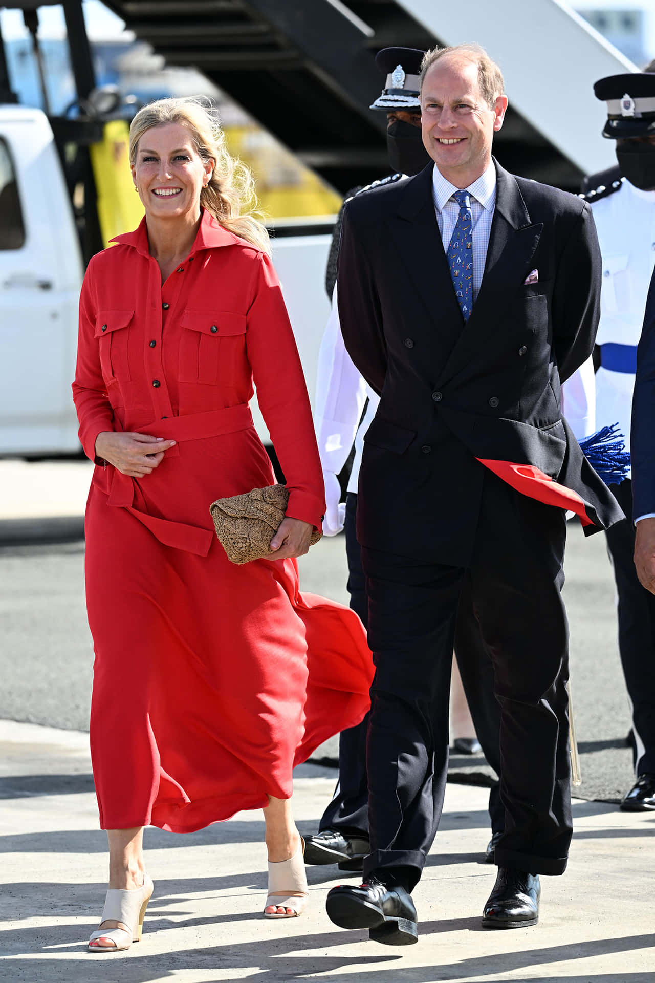 Prince Edward And Wife In Airport Background