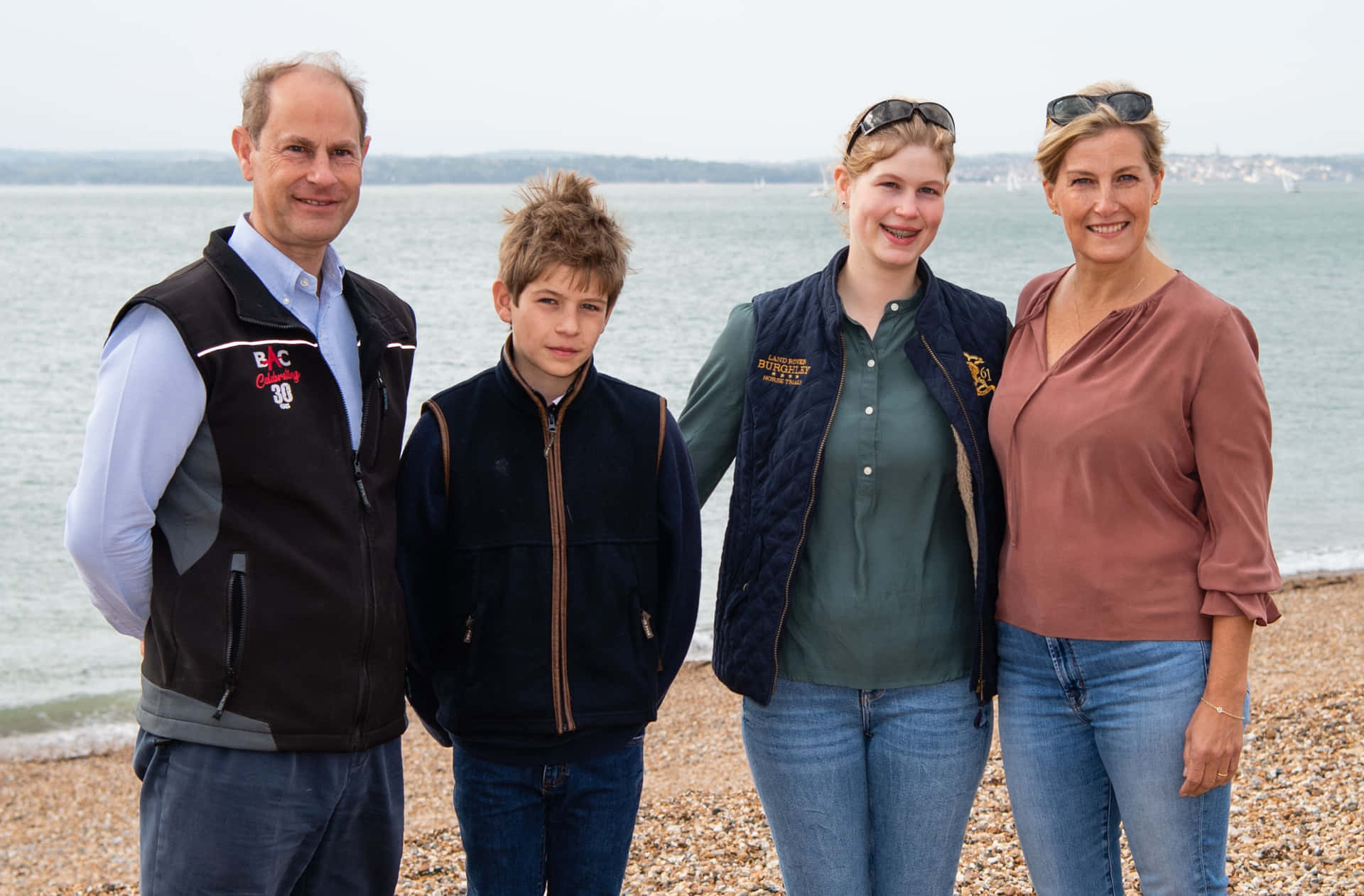 Prince Edward With Family In Beach Background