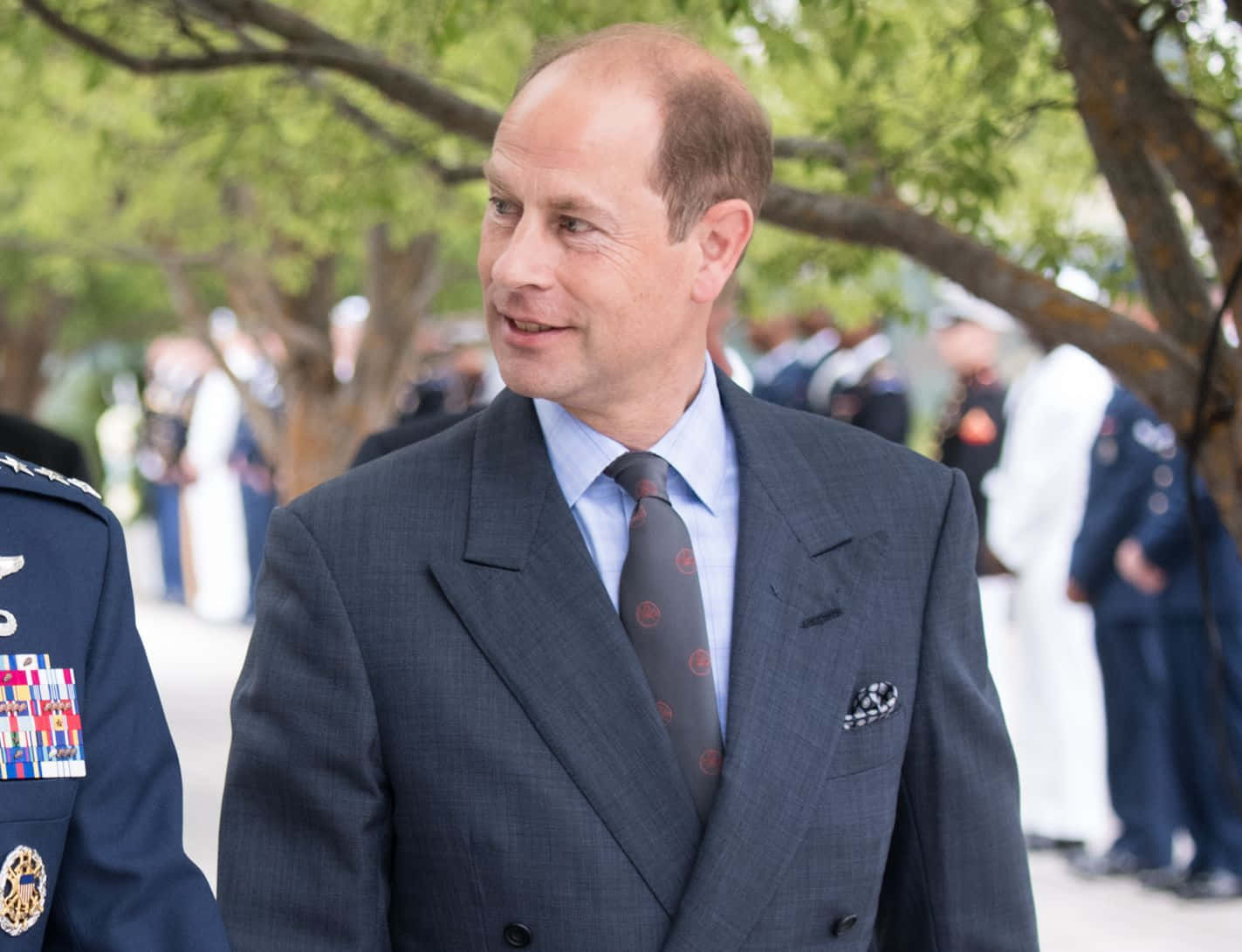 Prince Edward With Police Officer Background