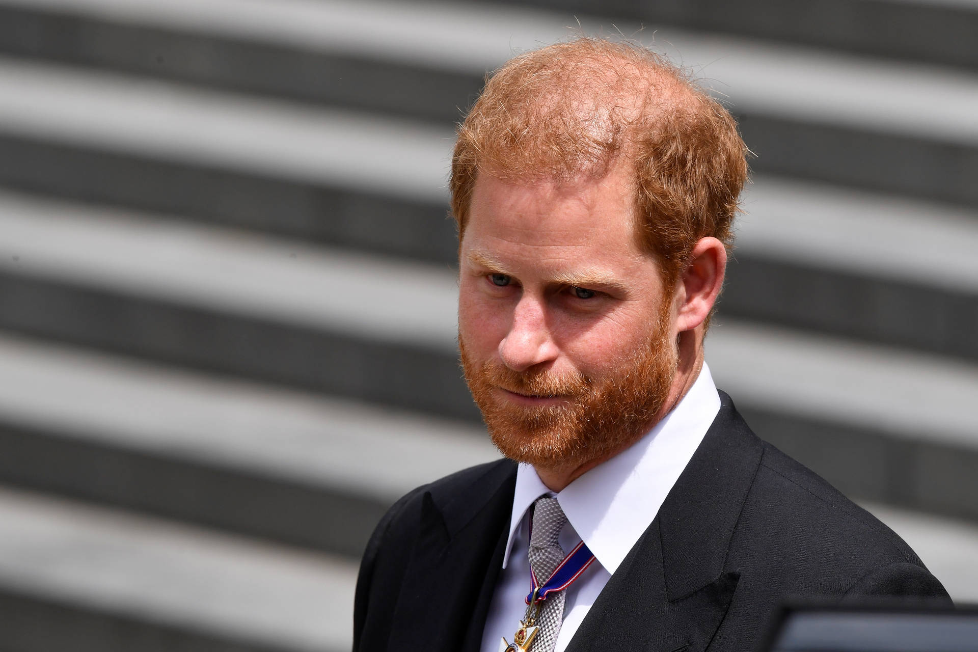 Prince Harry Exuding Confidence And Royal Sophistication Background