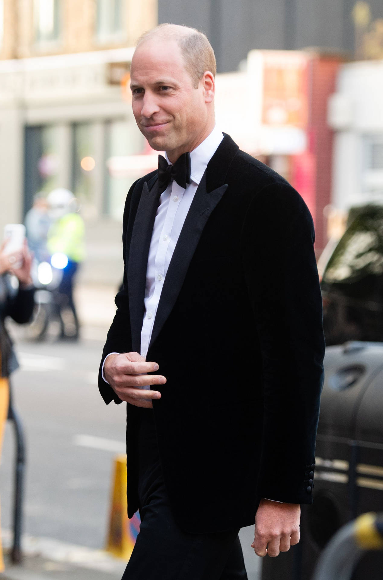 Prince William Dressed Elegantly In Black Bowtie Background