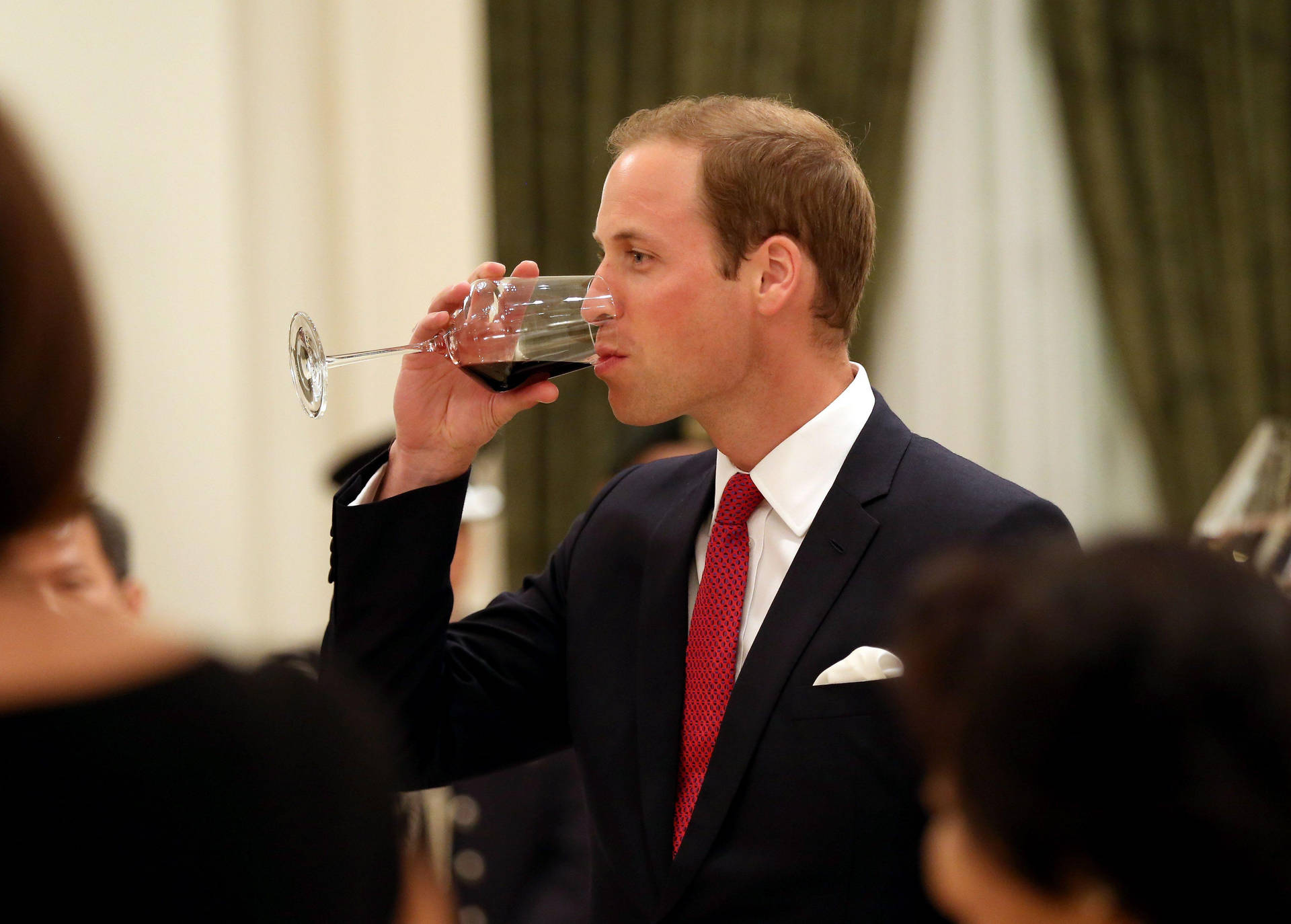 Prince William Drinking Wine Background