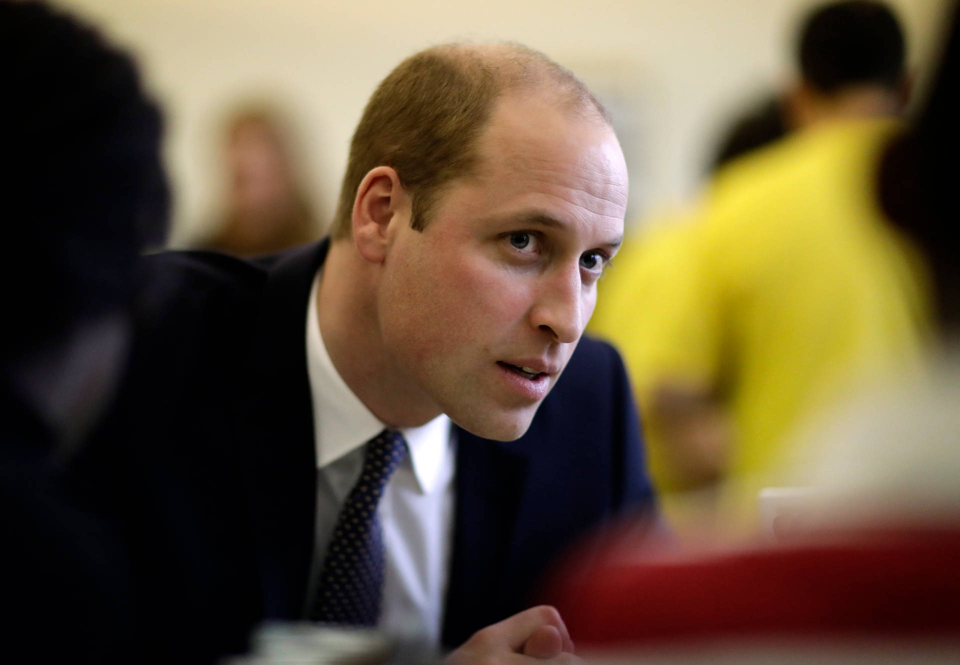 Prince William Engages Sincerely In A Conversation Background