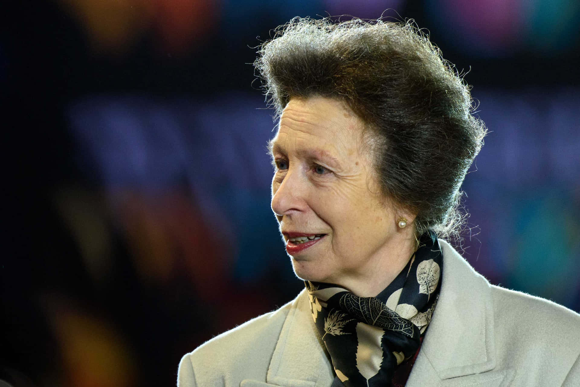 Princess Anne Wearing Beige Jacket With Scarf Background