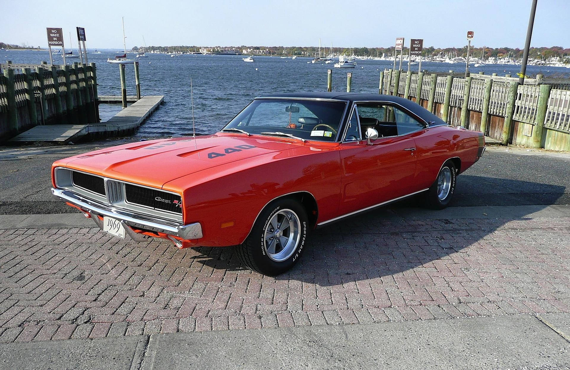 Pristine 1969 Dodge Charger Parked By The Bay Background