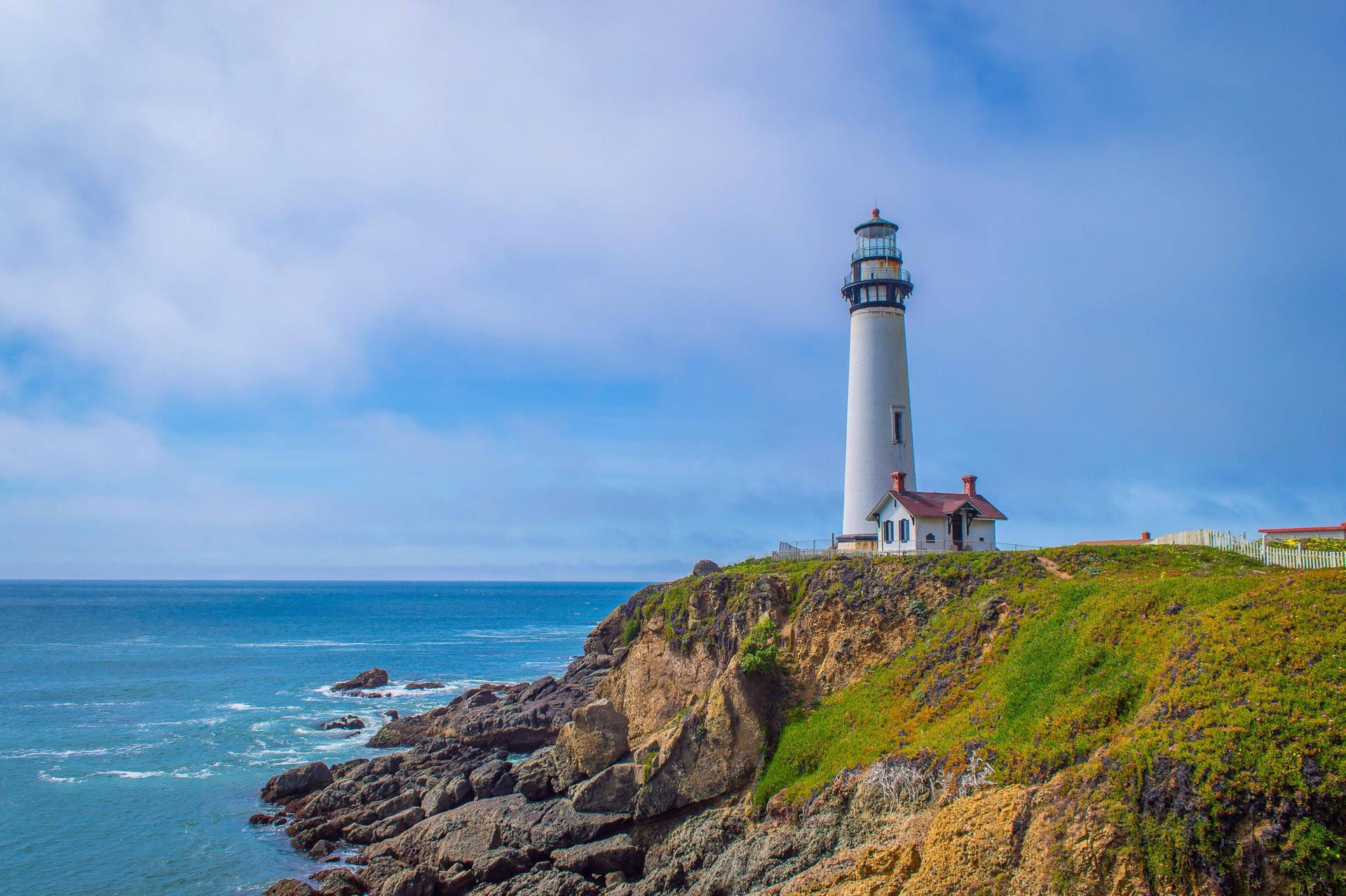 Pristine White Lighthouse Background