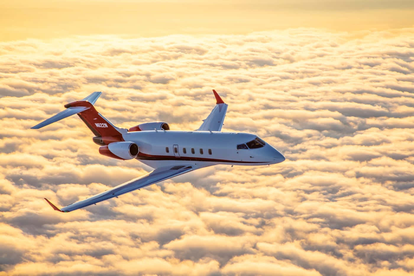 Private Jet Over Clouds Background