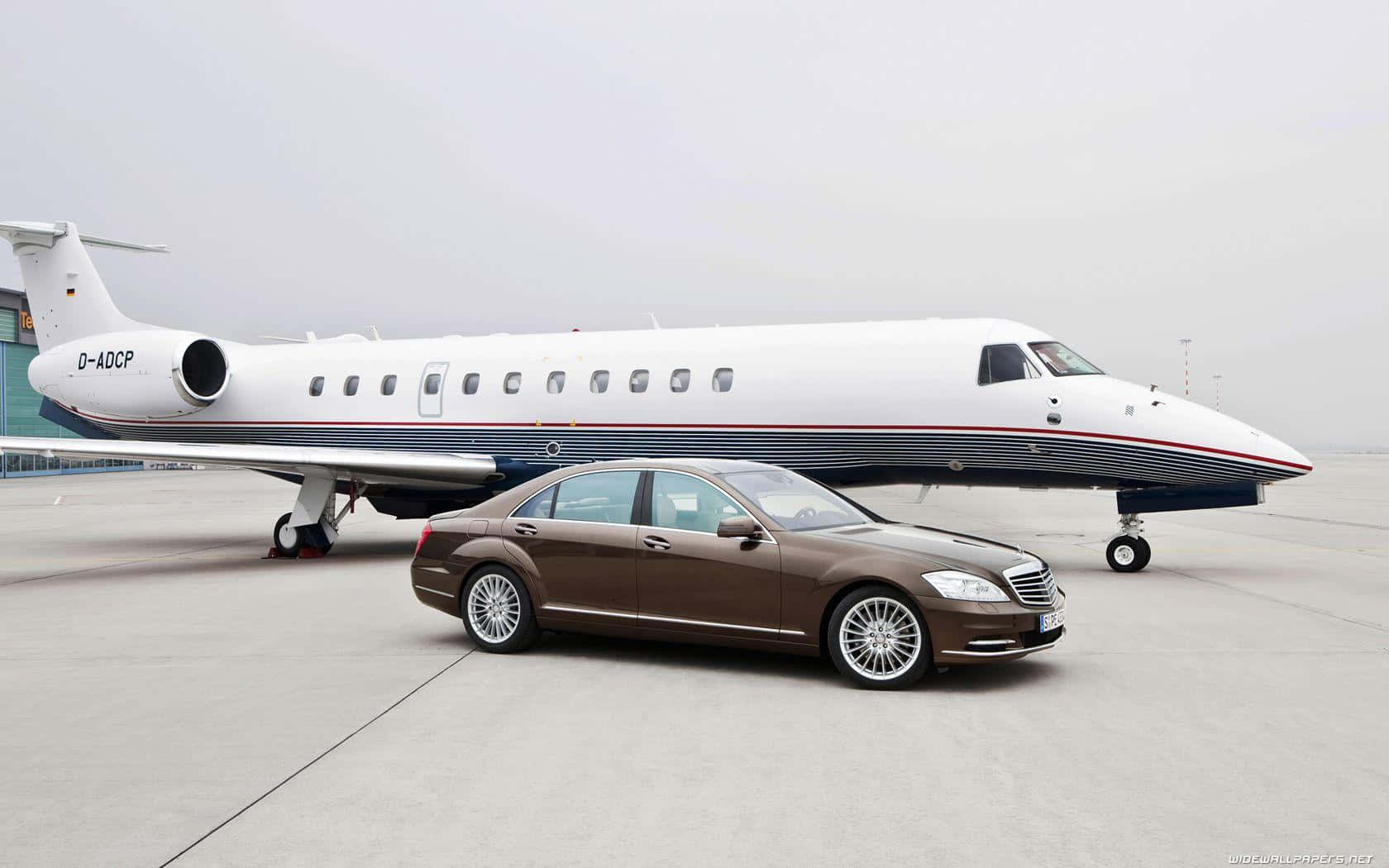 Private Jet With Mercedes Background