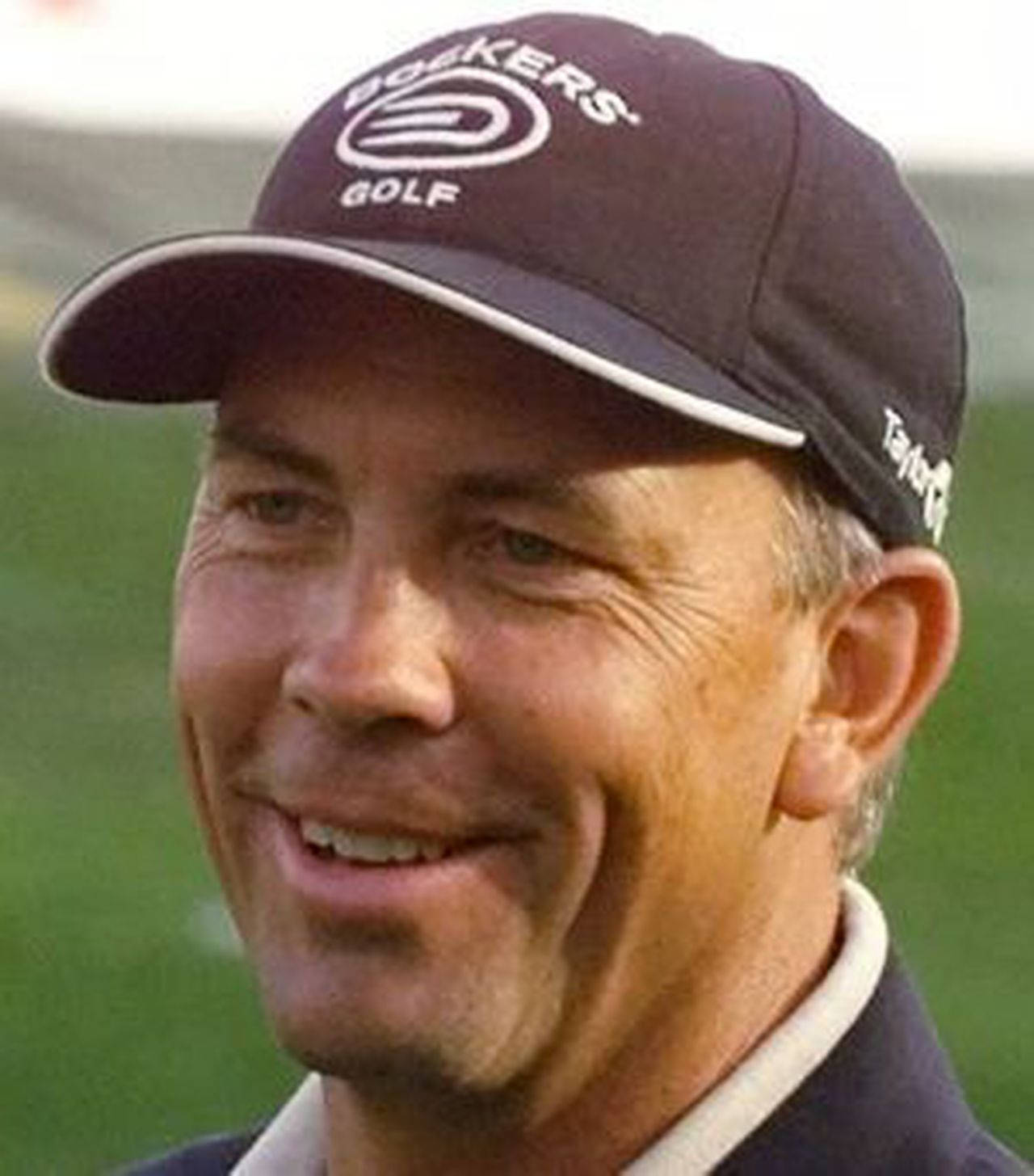 Pro Golfer Tom Lehman In Action Background