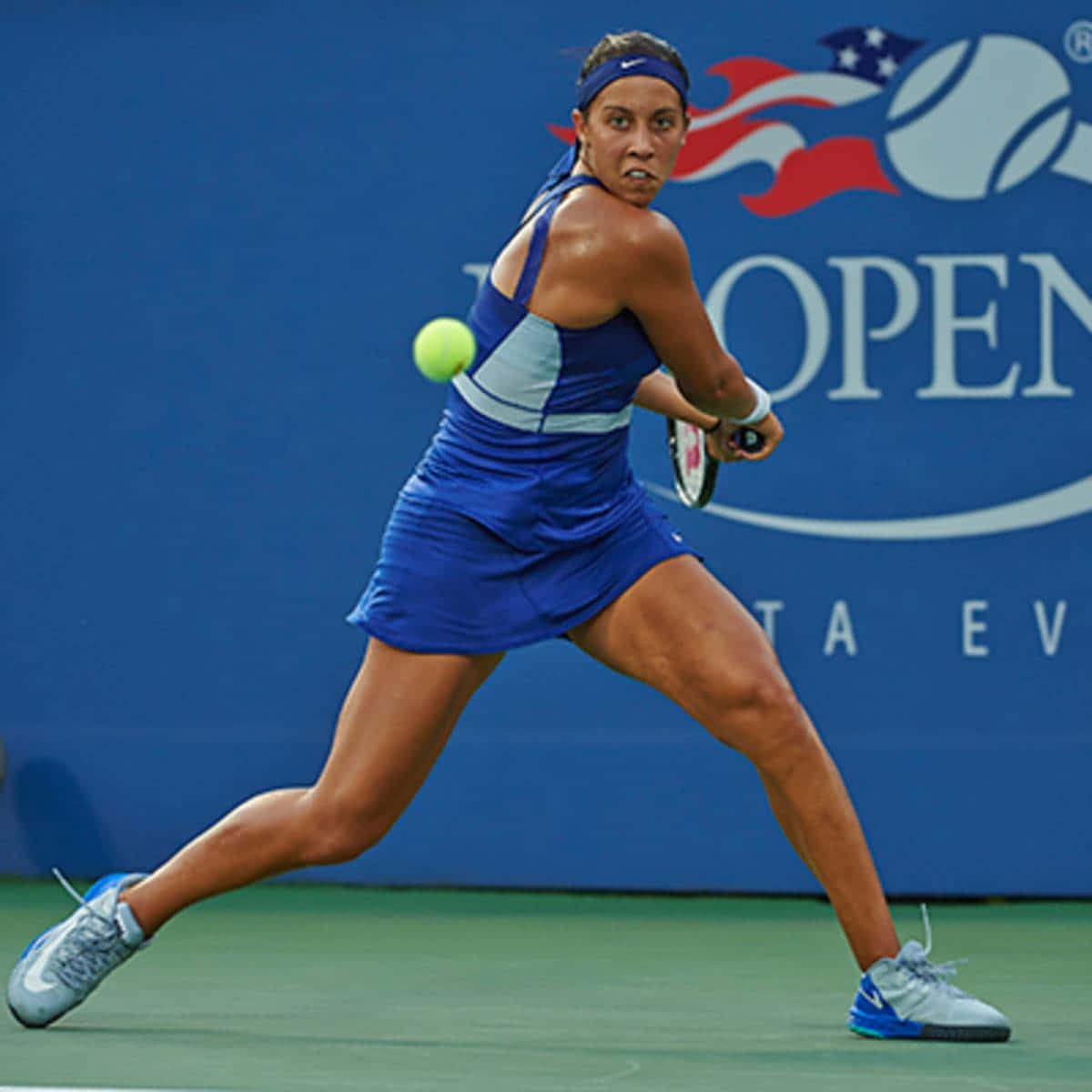 Pro Tennis Player Madison Keys In Action Background