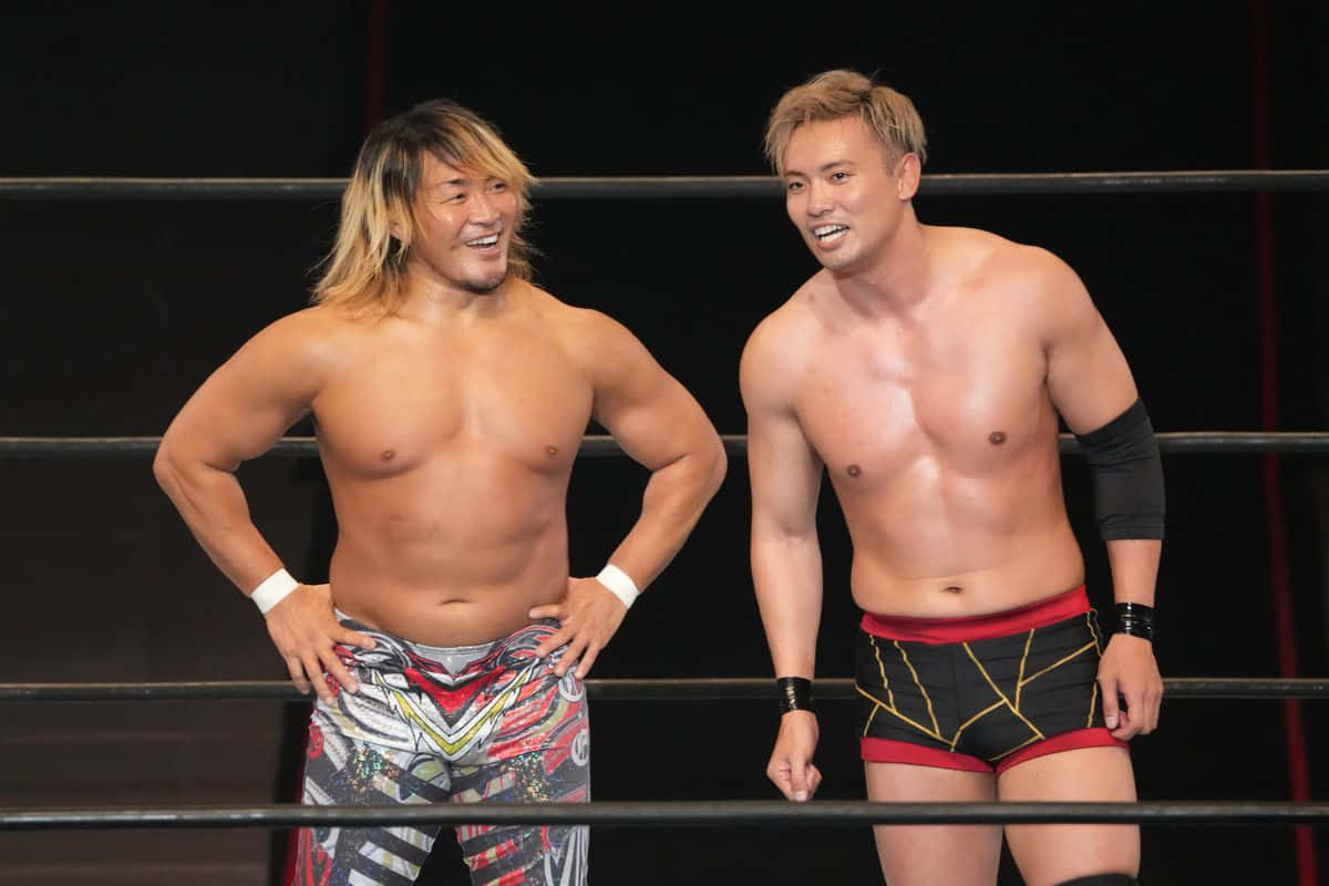 Pro Wrestlers Smilingin Ring