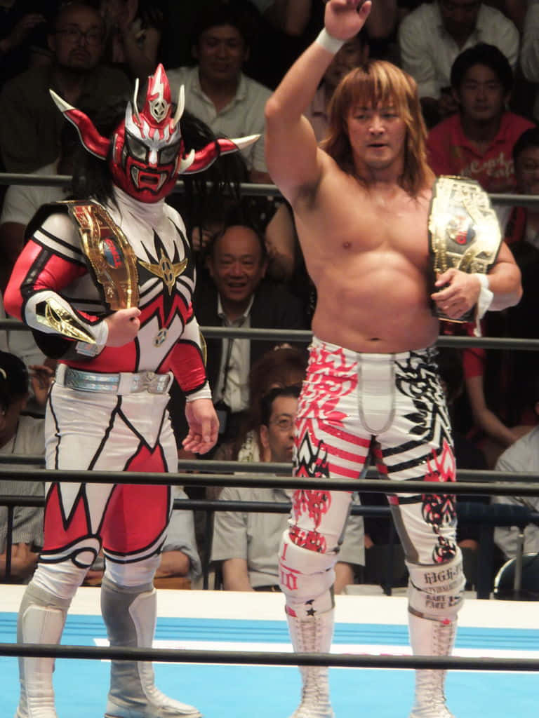 Pro Wrestlersin Ring Victory Pose