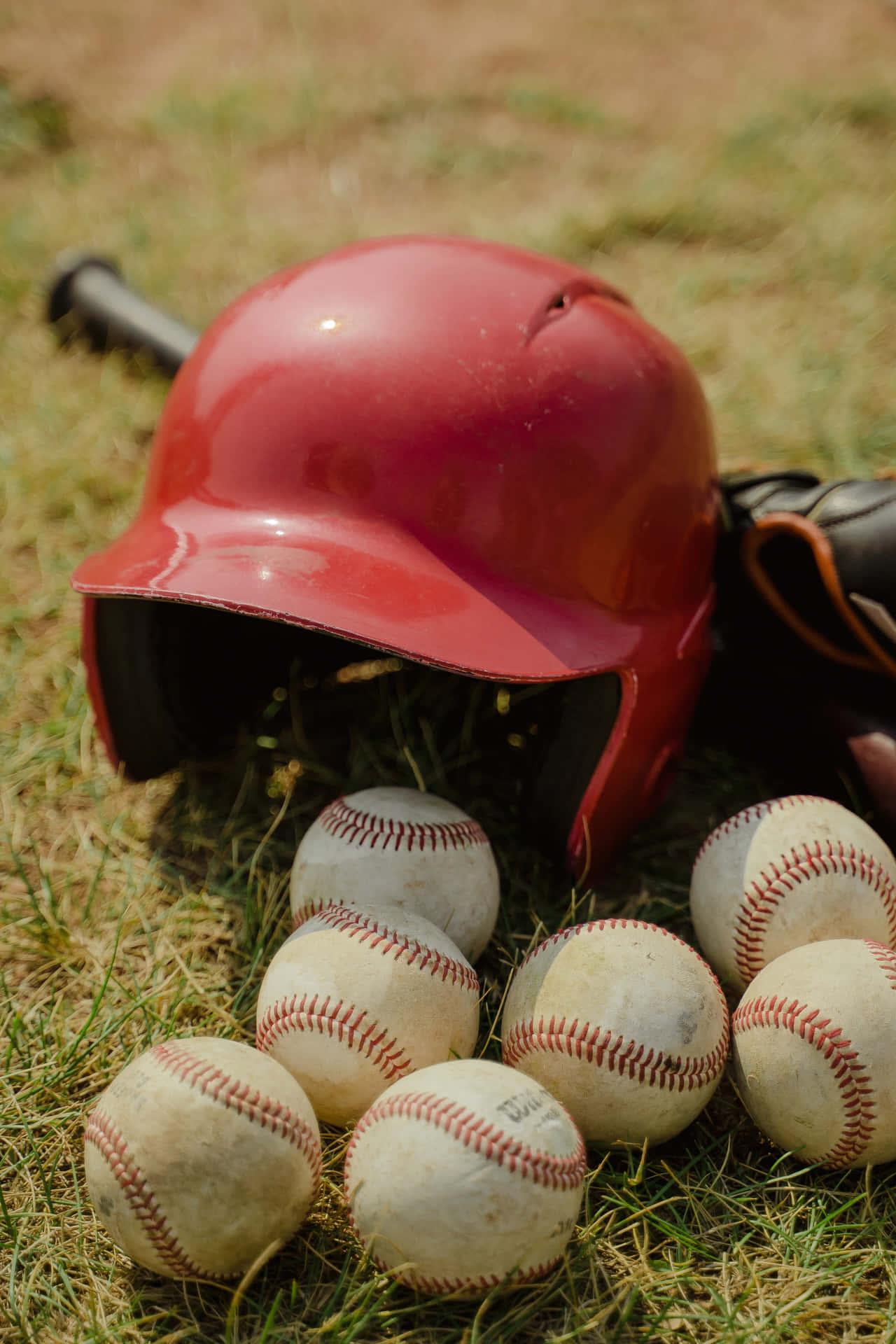 Professional Baseball Player Swinging A Baseball Bat Background