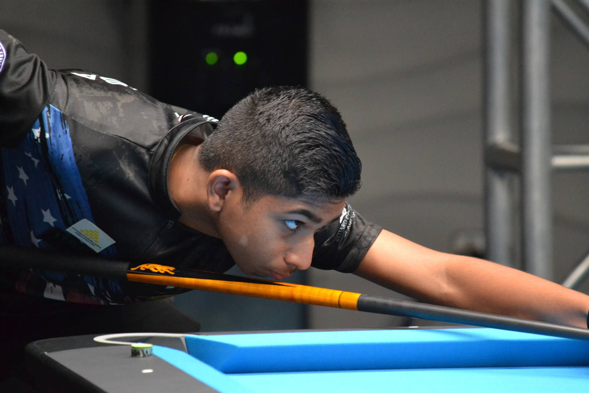 Professional Billiards Player Aiming For The Shot Background