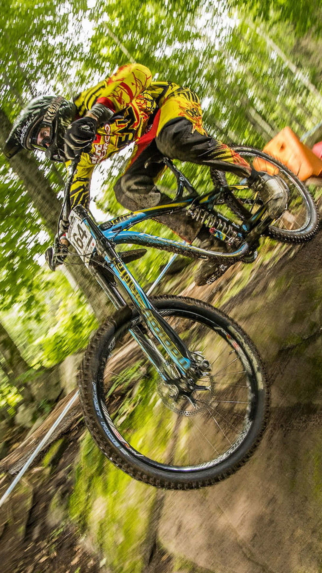 Professional Bmxer Attempting A Grind On A Rail Background