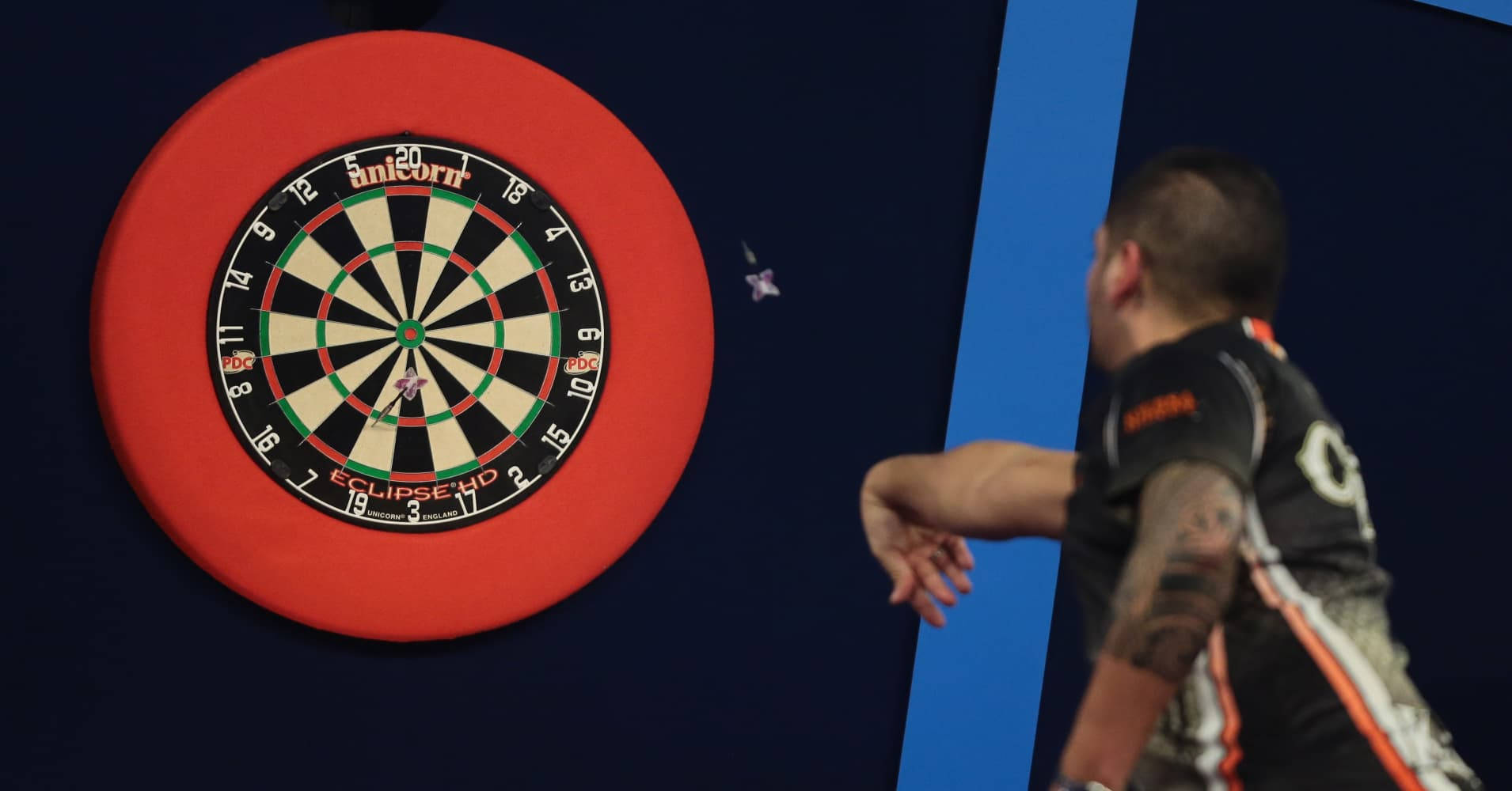 Professional Darts Player In Action Background