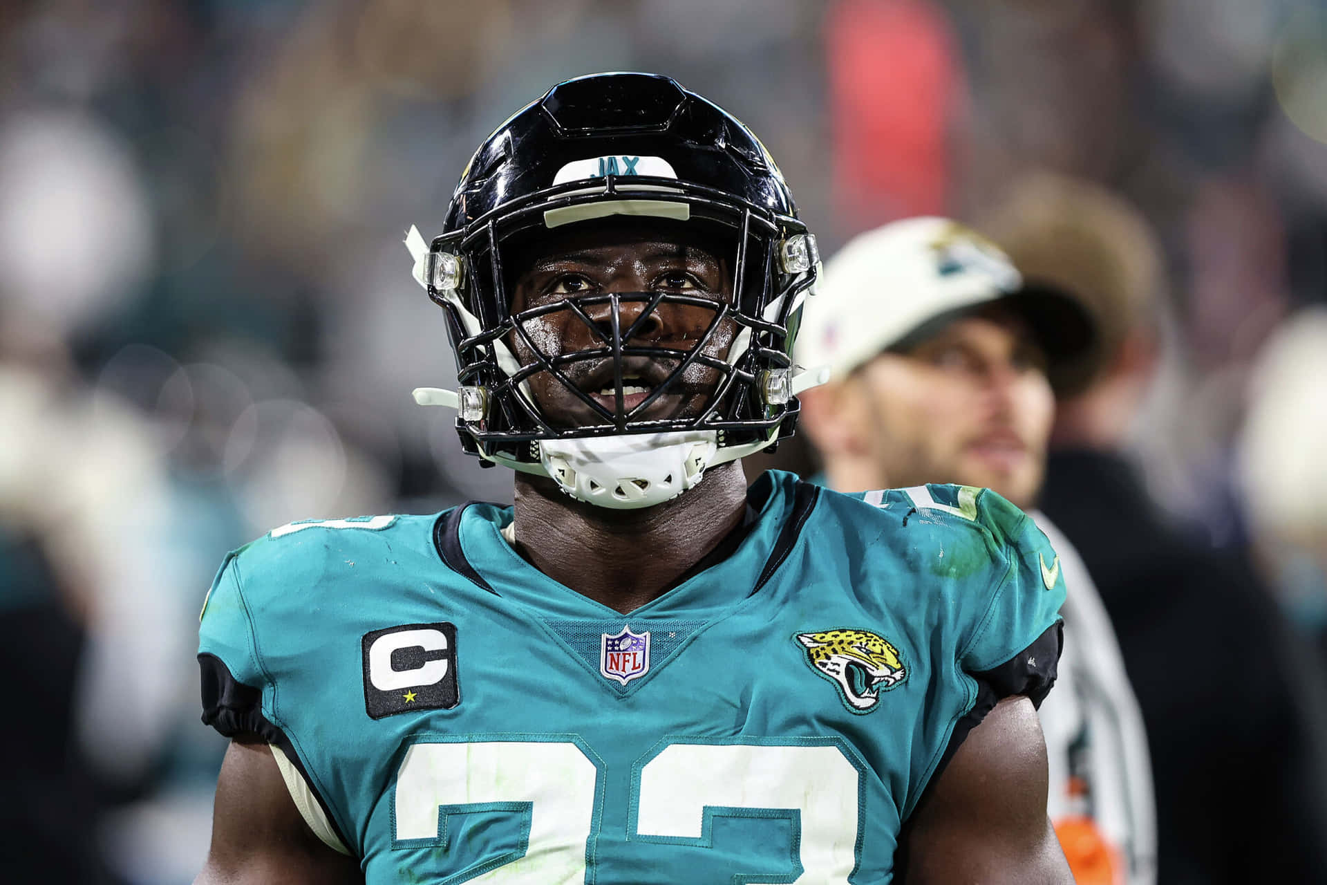 Professional Football Linebacker On Field Background