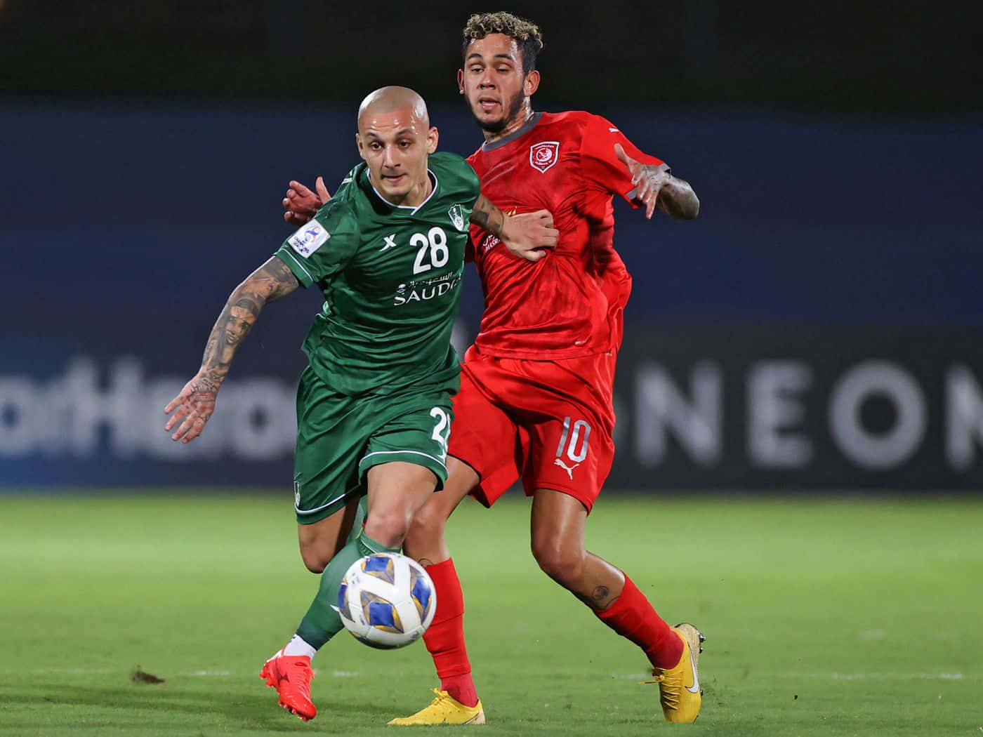 Professional Footballer Alexandru Mitrita In Action For Al Ahli Saudi Football Club Background