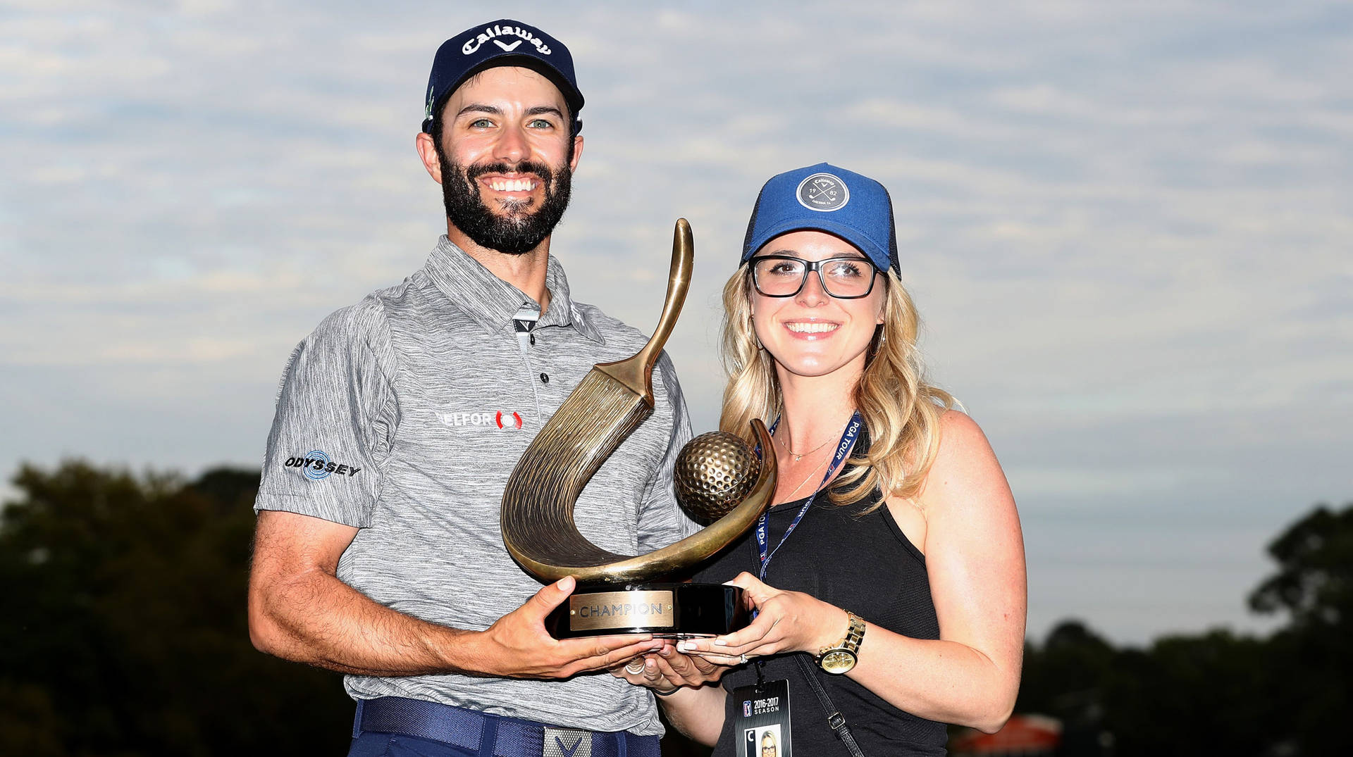 Professional Golfer Adam Hadwin In Action Background