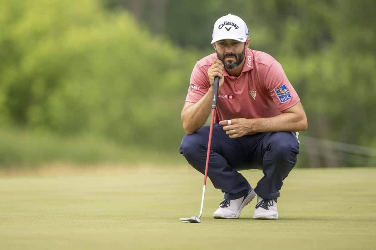 Professional Golfer Adam Hadwin In Action During A Golf Tournament Background