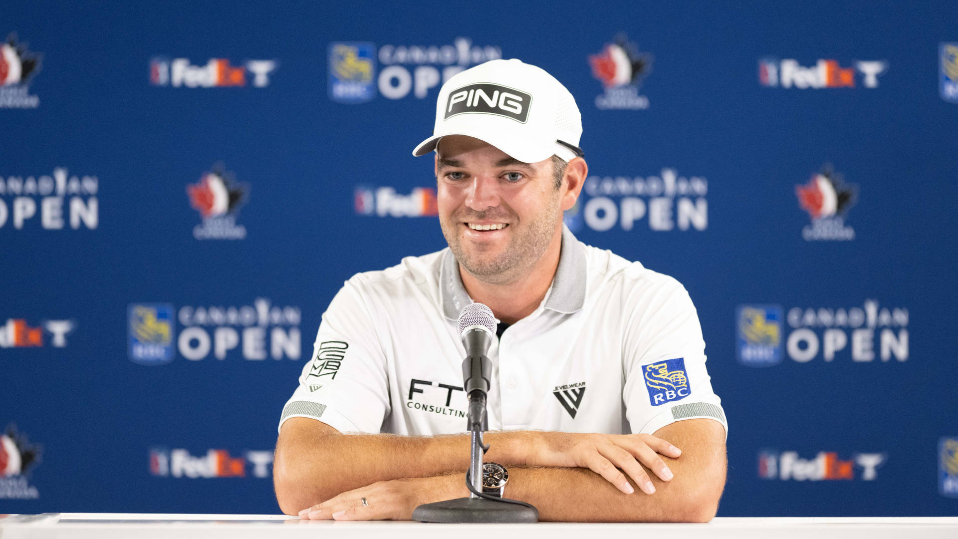 Professional Golfer Corey Conners During An Interview Background