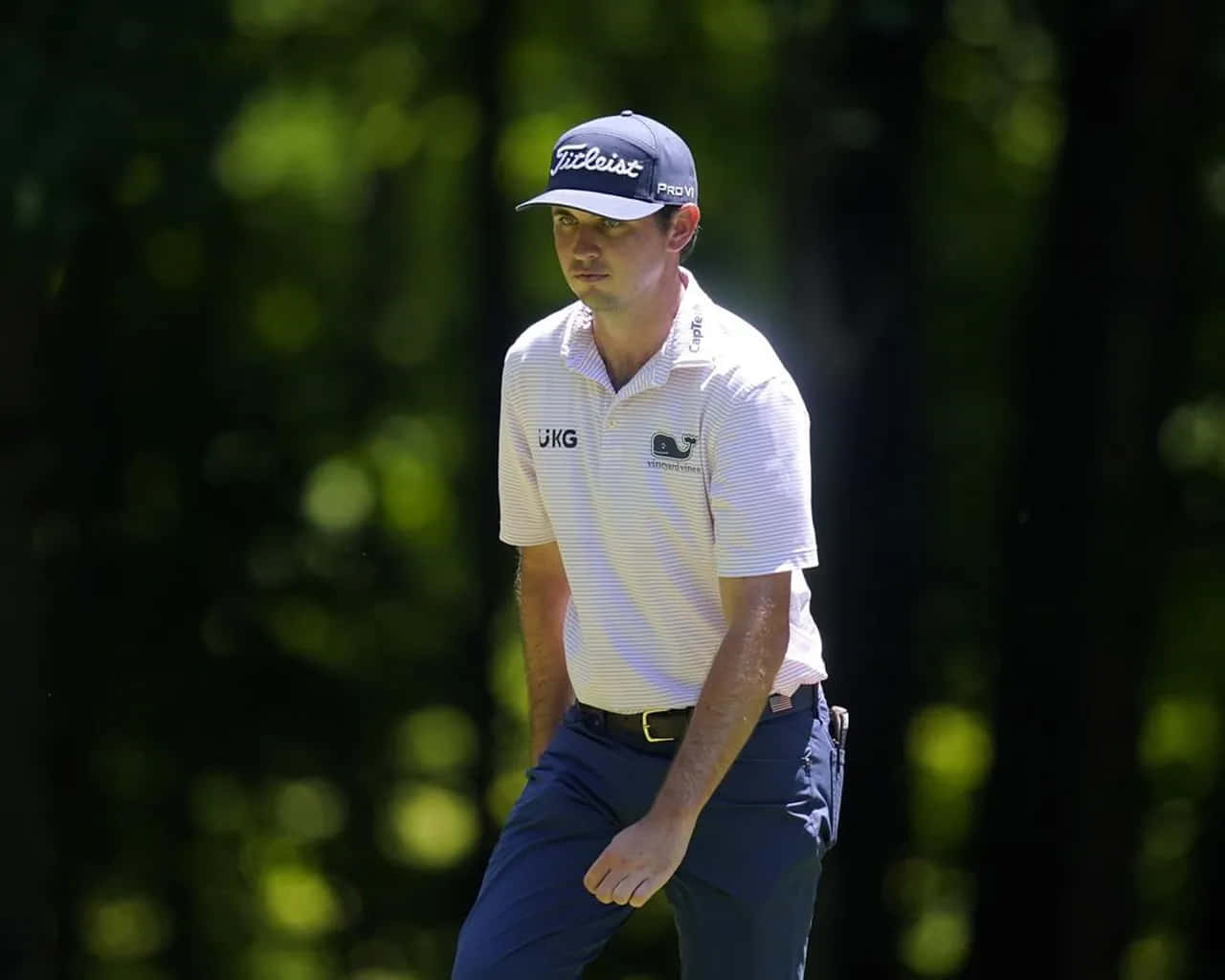 Professional Golfer J.t. Poston In Action On The Course. Background
