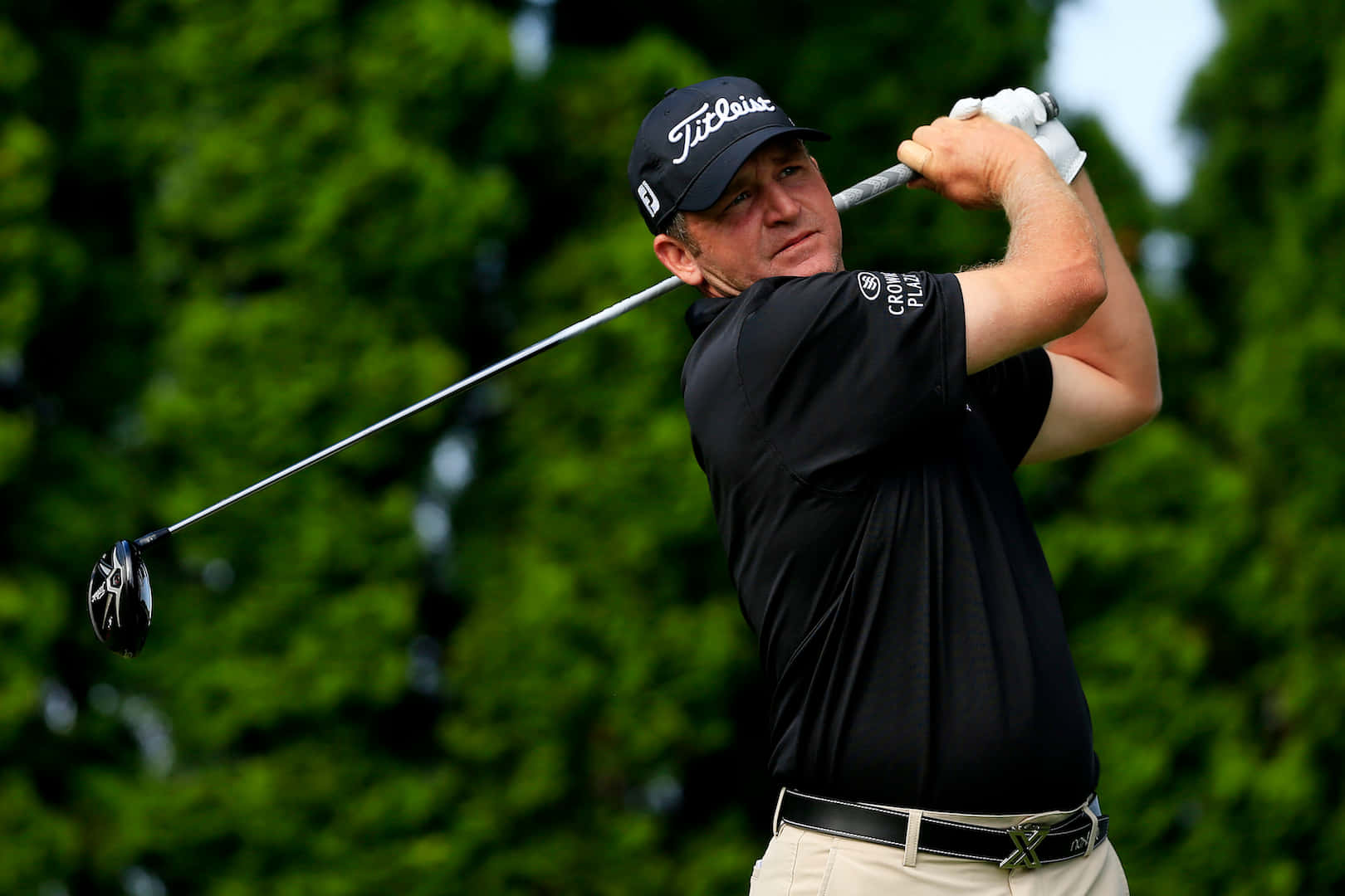 Professional Golfer Jason Bohn In A Black Shirt Background
