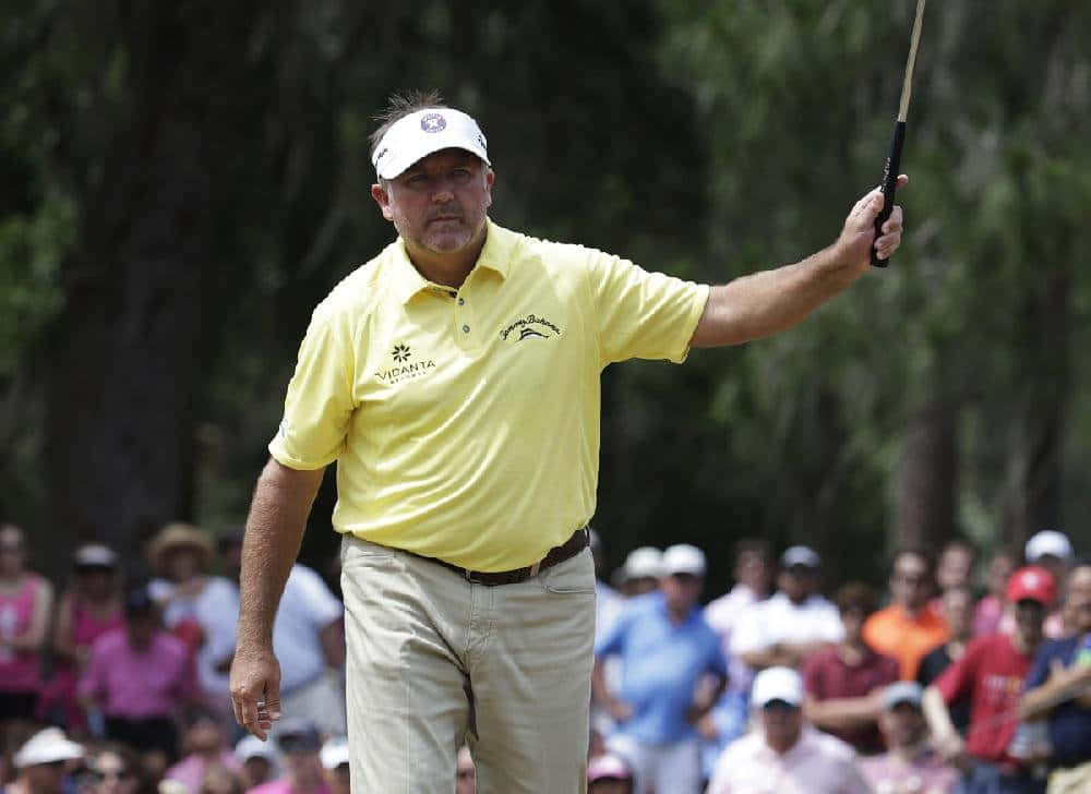 Professional Golfer Ken Duke At Work Background