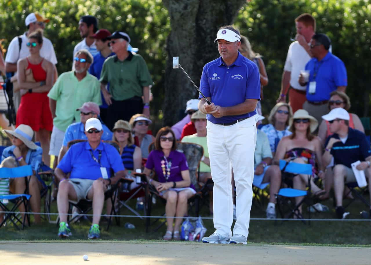 Professional Golfer Ken Duke On The Golf Course Background