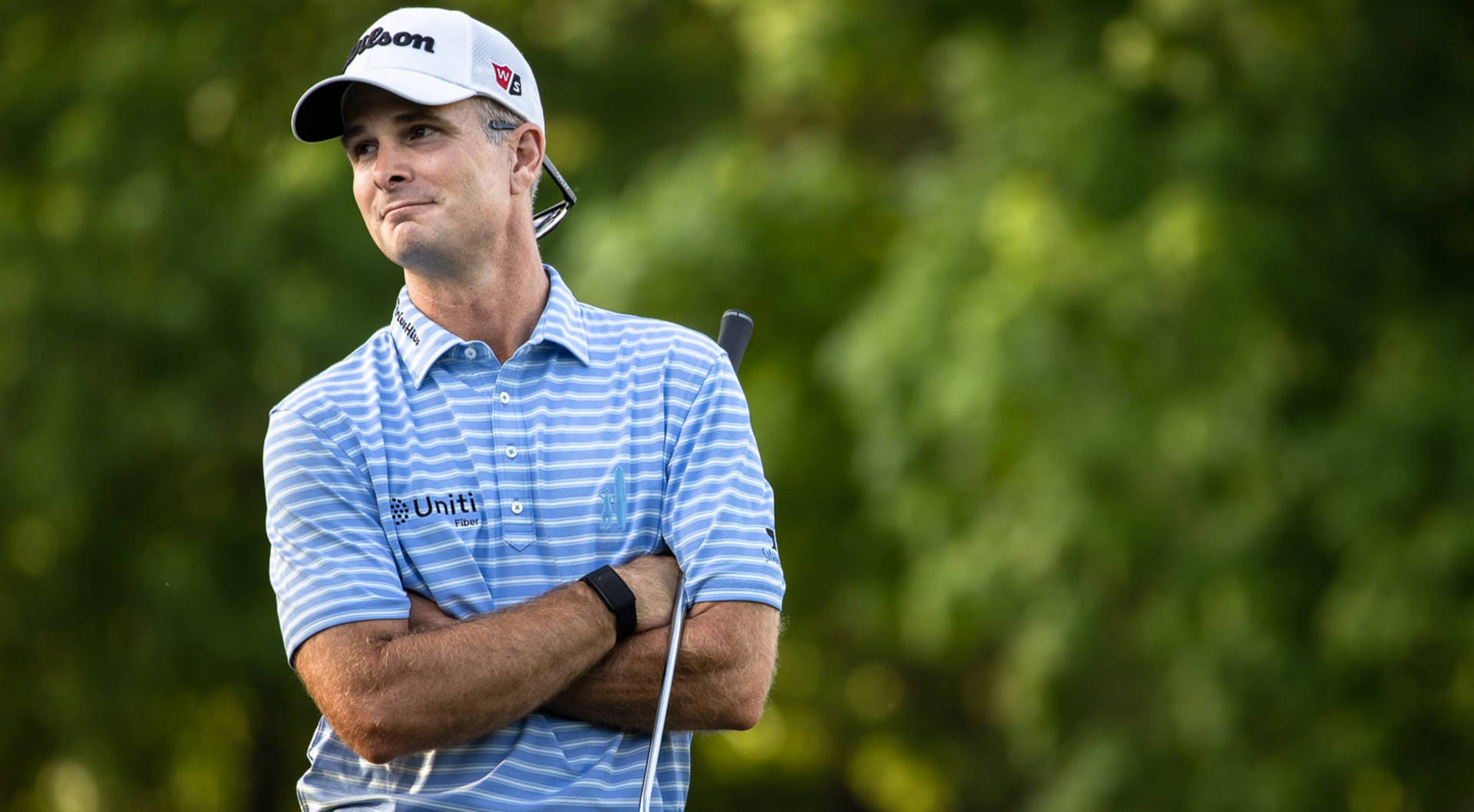 Professional Golfer Kevin Streelman Arms Crossed With A Focused Expression. Background