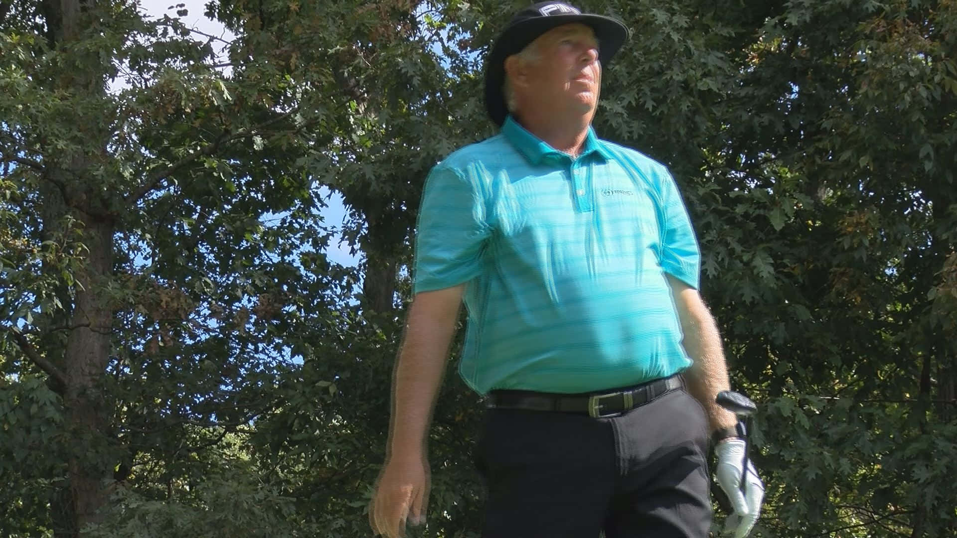 Professional Golfer Kirk Triplett Ready For A Swing Background