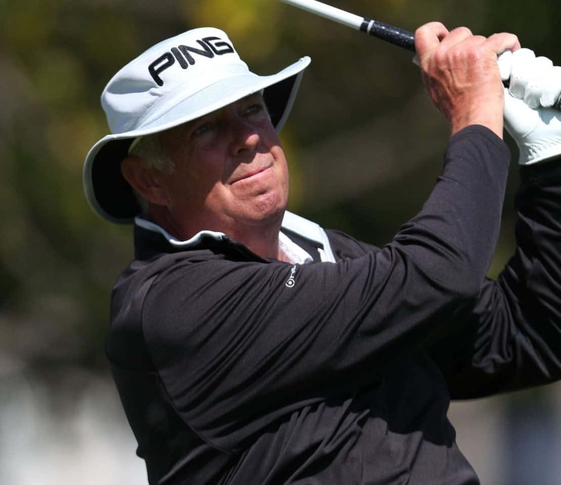 Professional Golfer Kirk Triplett Wearing A Black Jacket Background