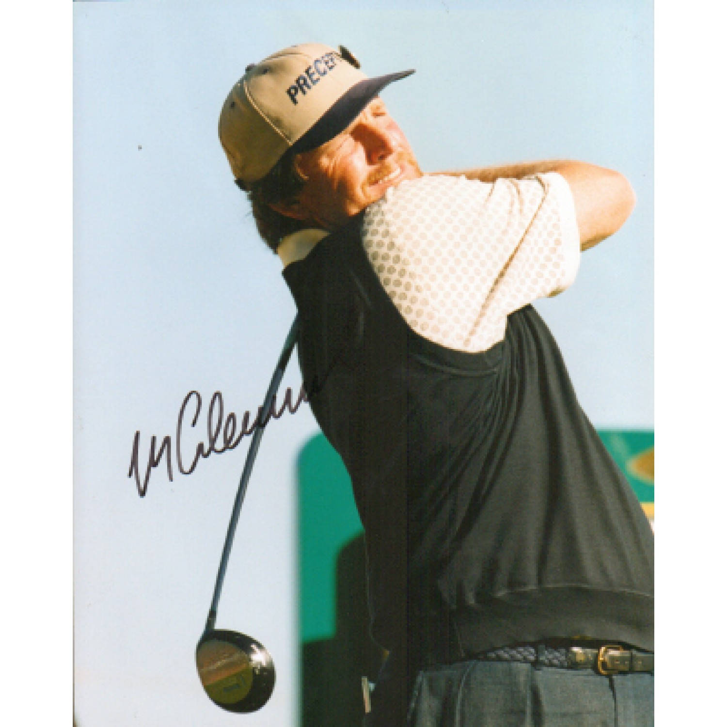 Professional Golfer Mark Calcavecchia In A Sunlit Shot, Looking Focused In A Brown Cap. Background