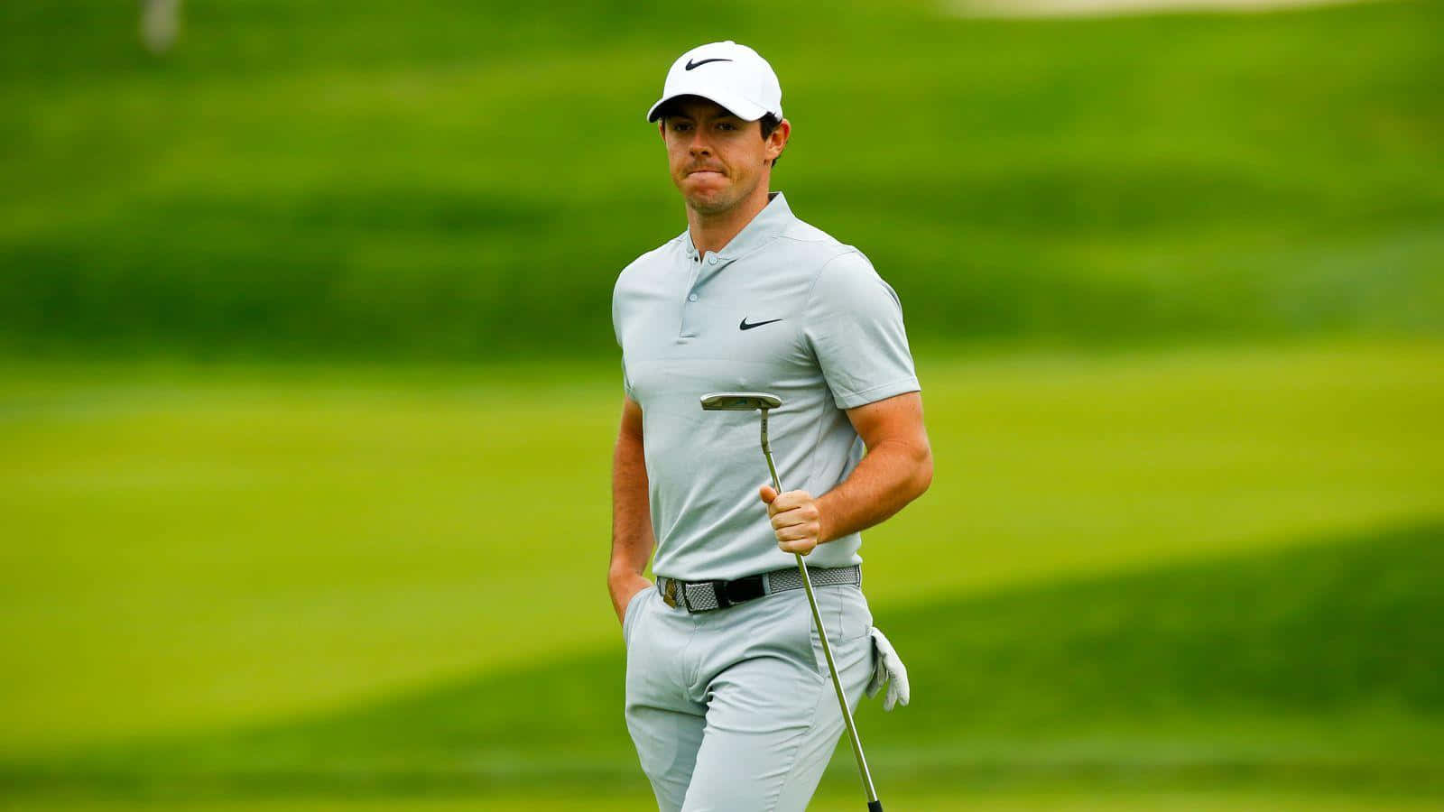 Professional Golfer Rory Mcilroy Swings With Precision