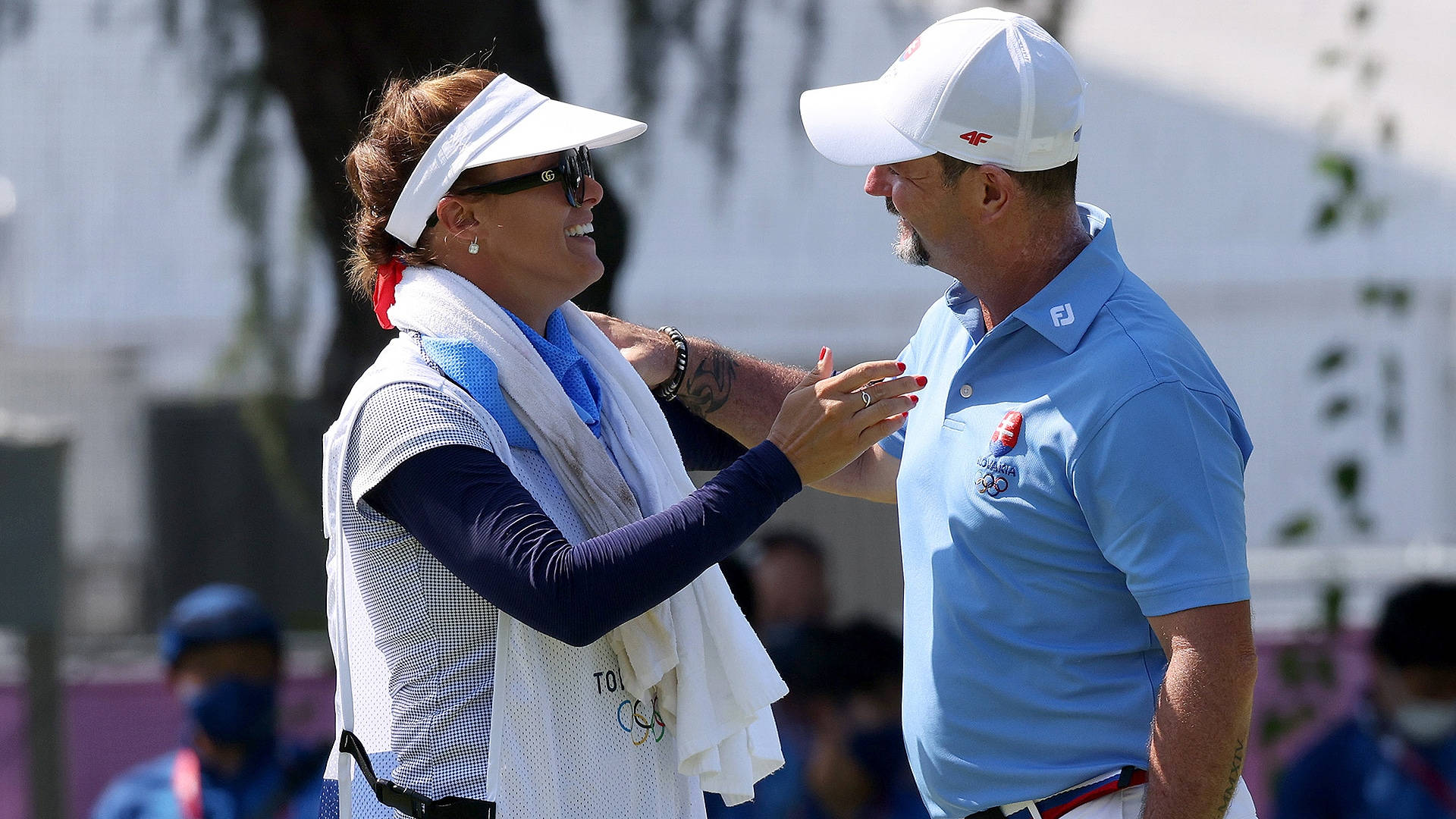 Professional Golfer Rory Sabbatini Gazing At His Wife In A Candid Moment Background