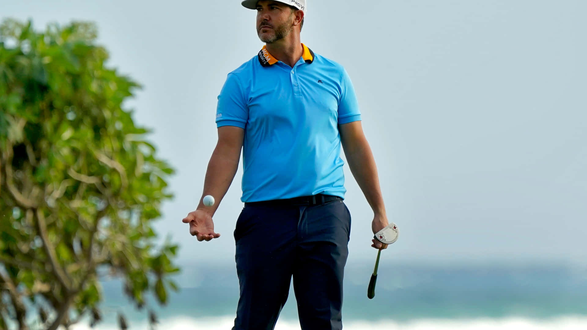 Professional Golfer Scott Piercy In Action Background