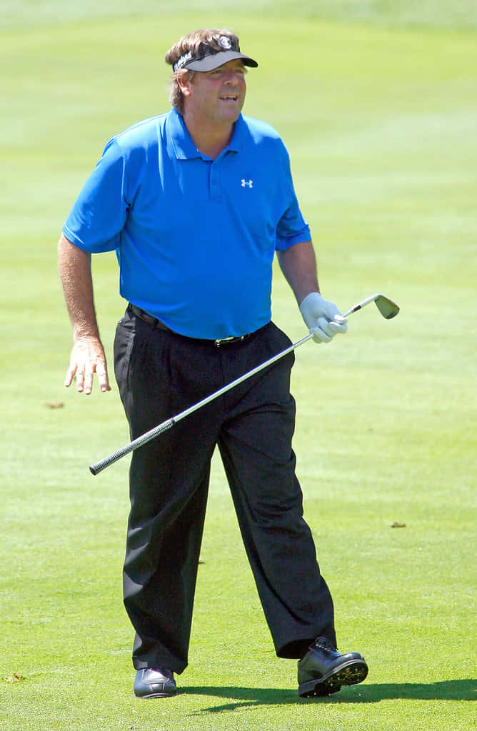 Professional Golfer, Steve Lowery, Mid Play On A Sunny Day At The Golf Course Background