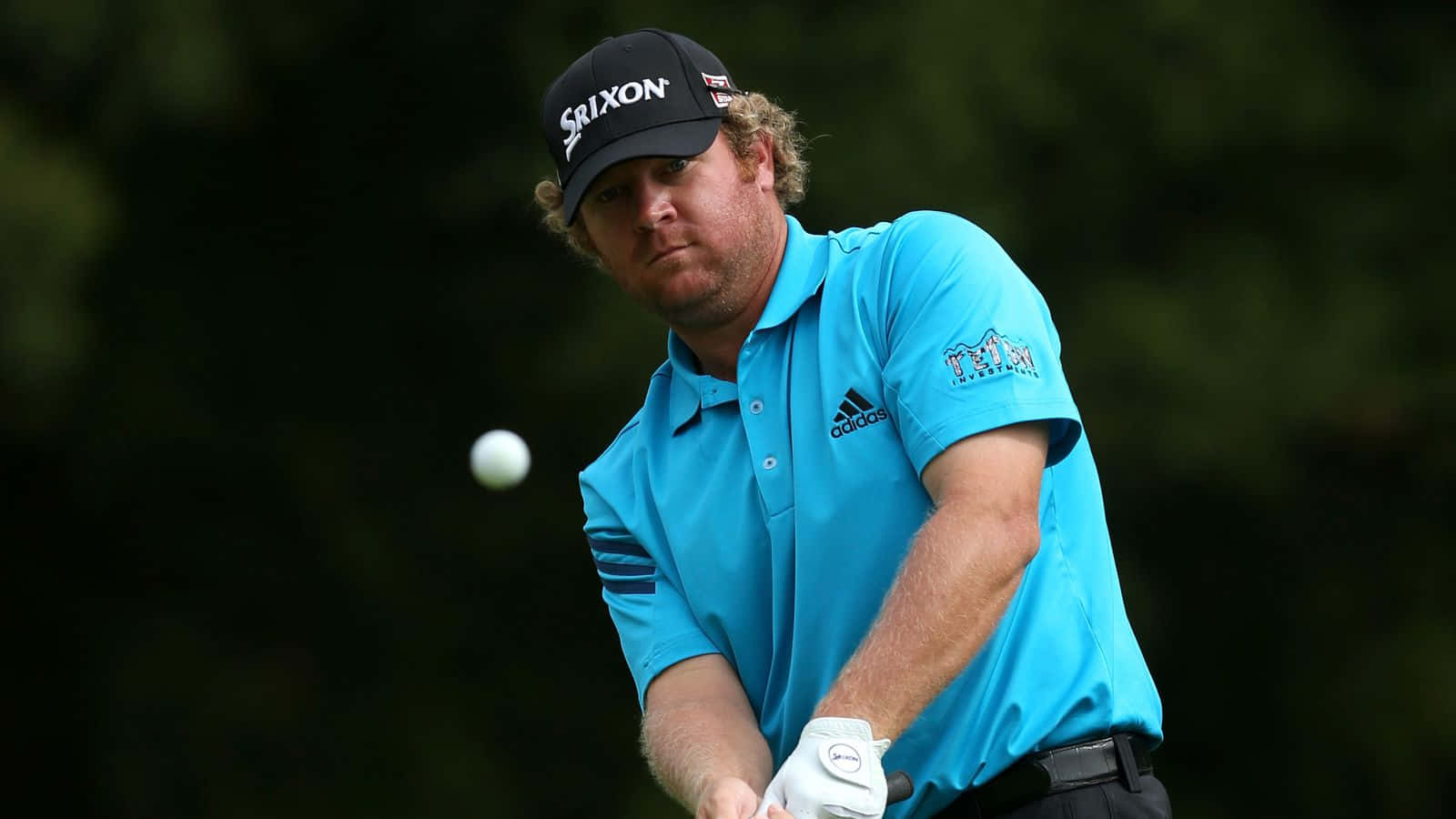 Professional Golfer William Mcgirt Focusing On The Ball Background