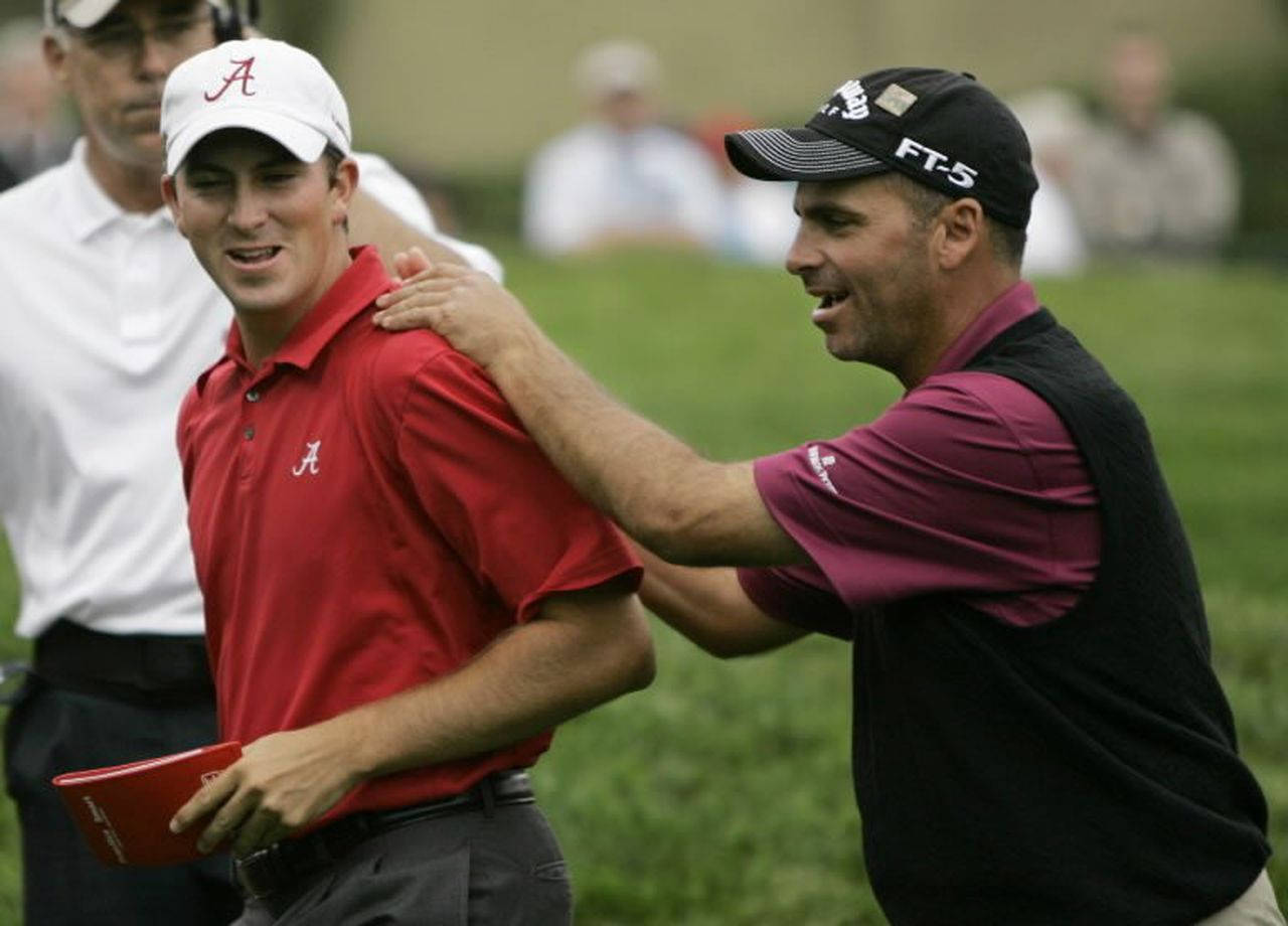 Professional Golfers Michael Thompson And Rocco Mediate In Action Background