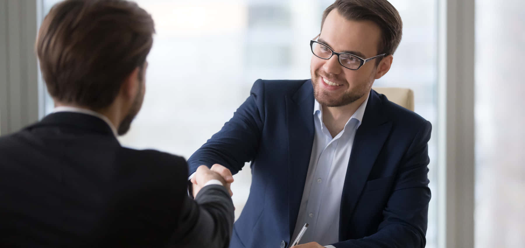 Professional Handshakeat Business Meeting Background