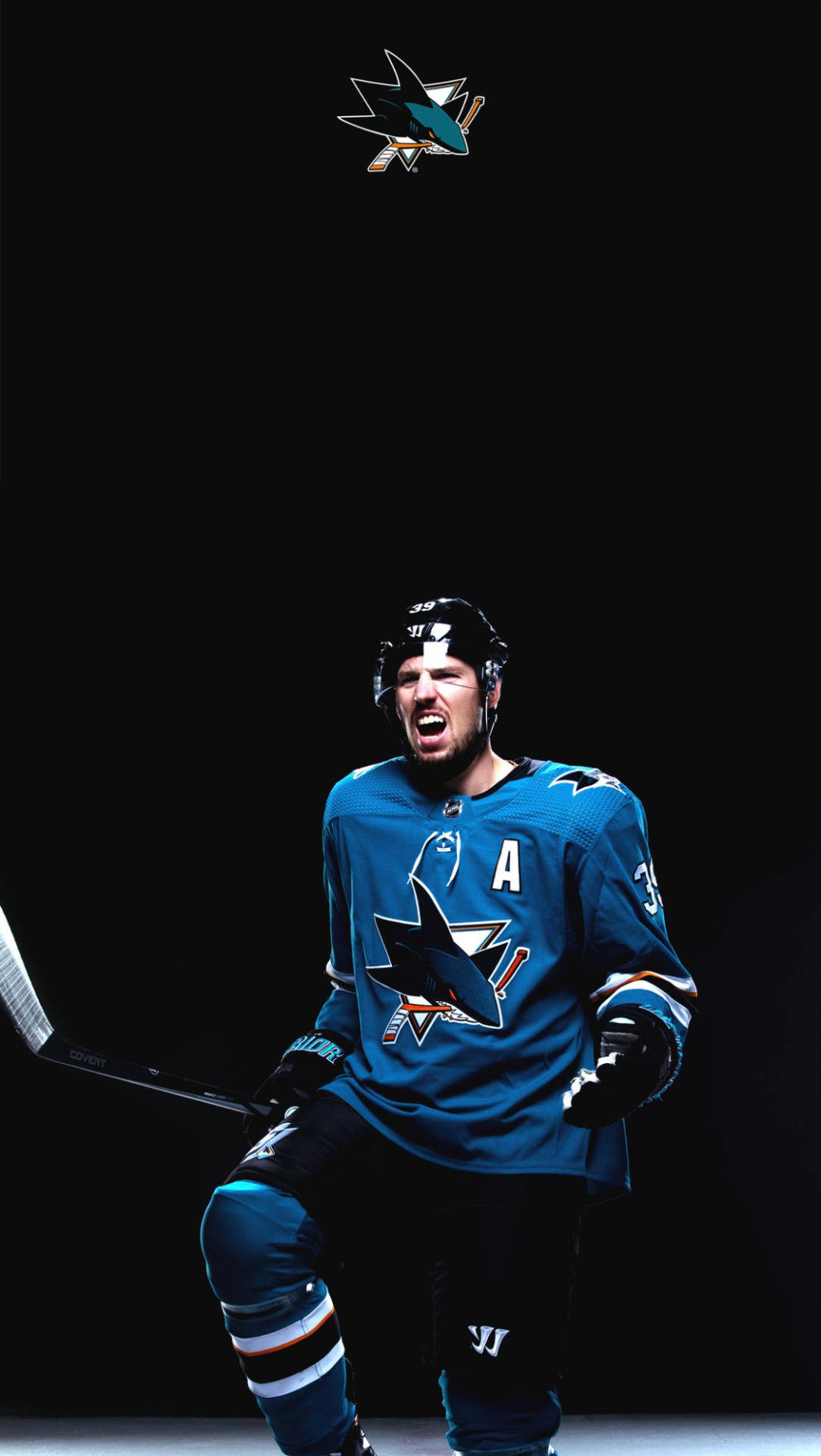 Professional Ice Hockey Center Logan Couture Alternate Captain Portrait Background